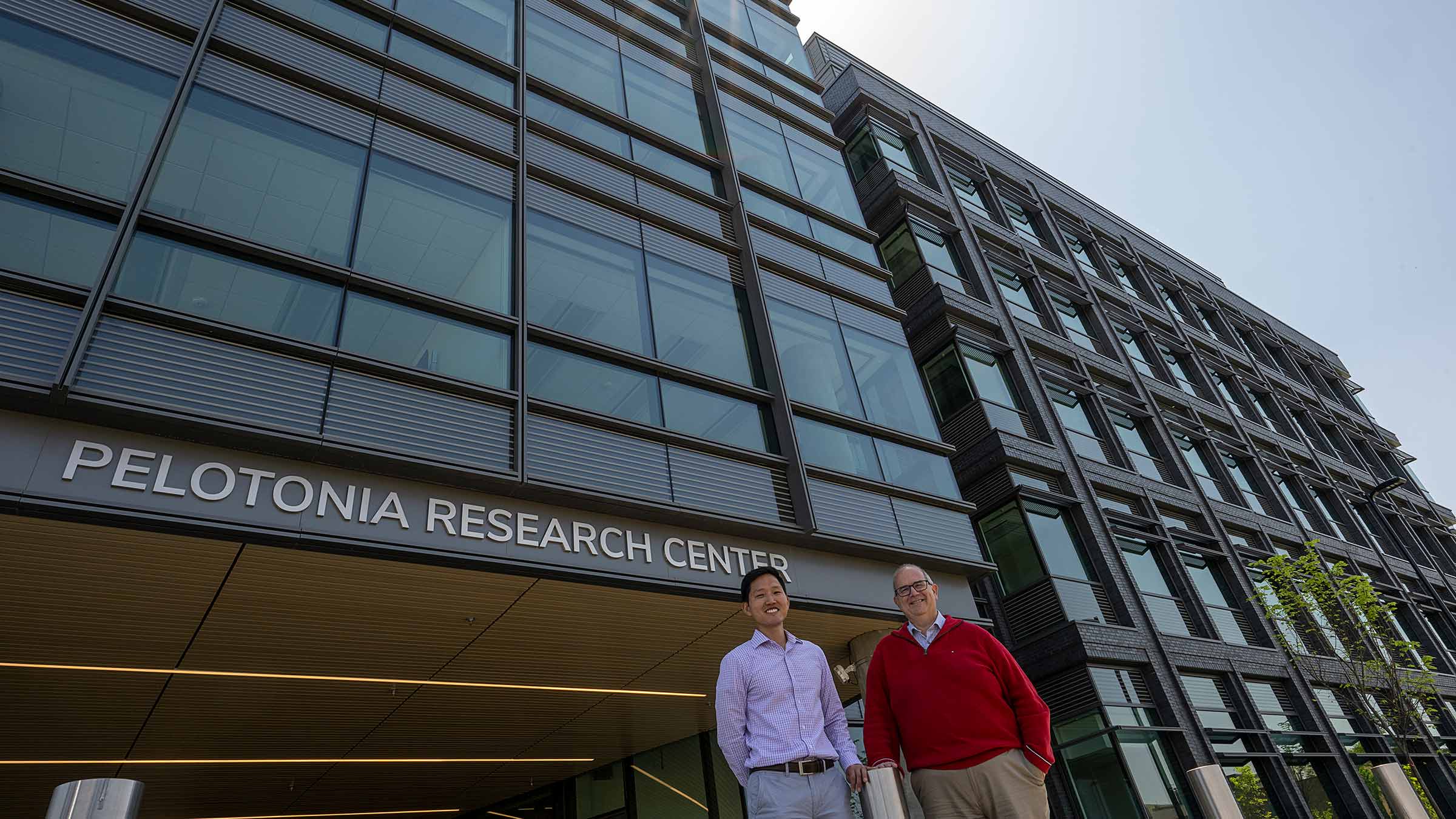 Drs. Ringel and Song near the new research center building