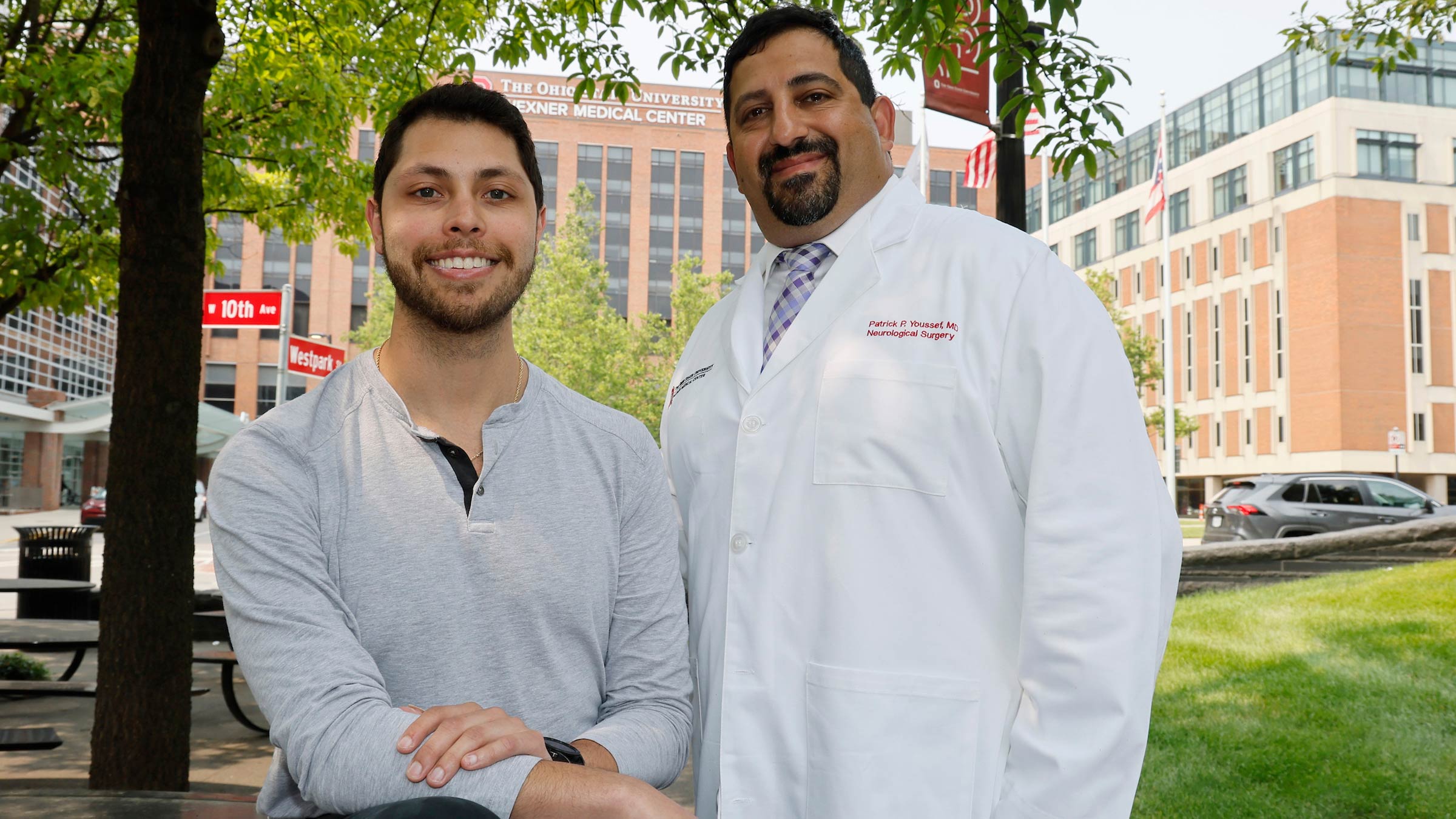 Stephen Vidman, stroke patient, with his vascular neurosurgeon, Patrick Youssef in front of the Wexner Medical Center