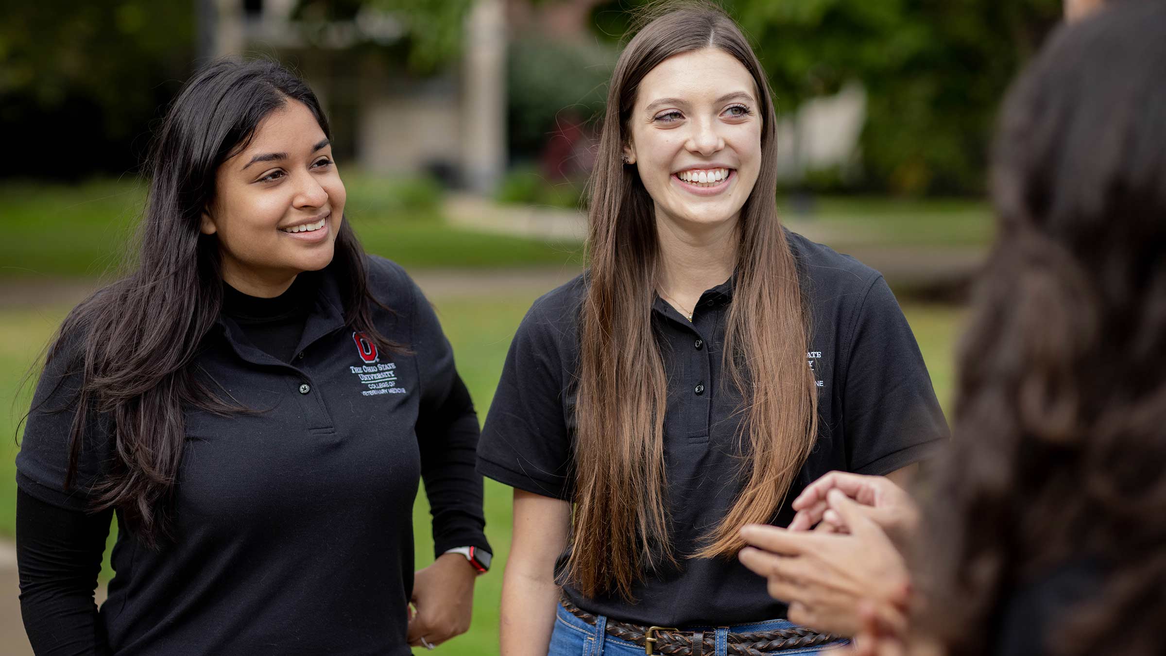 Three students talking