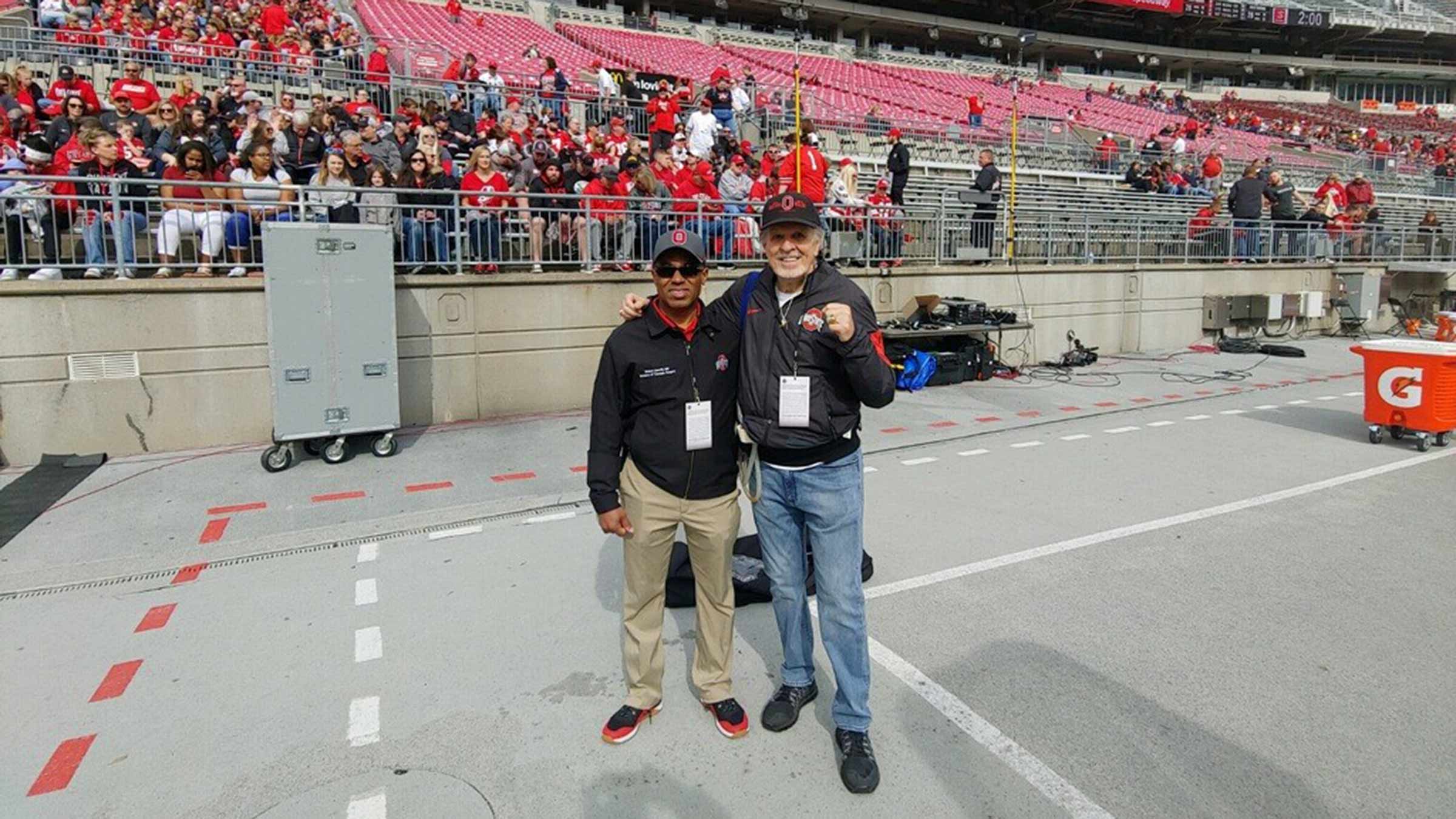 Dr. Merritt with John “Coach” Johnson at the Ohio State stadium