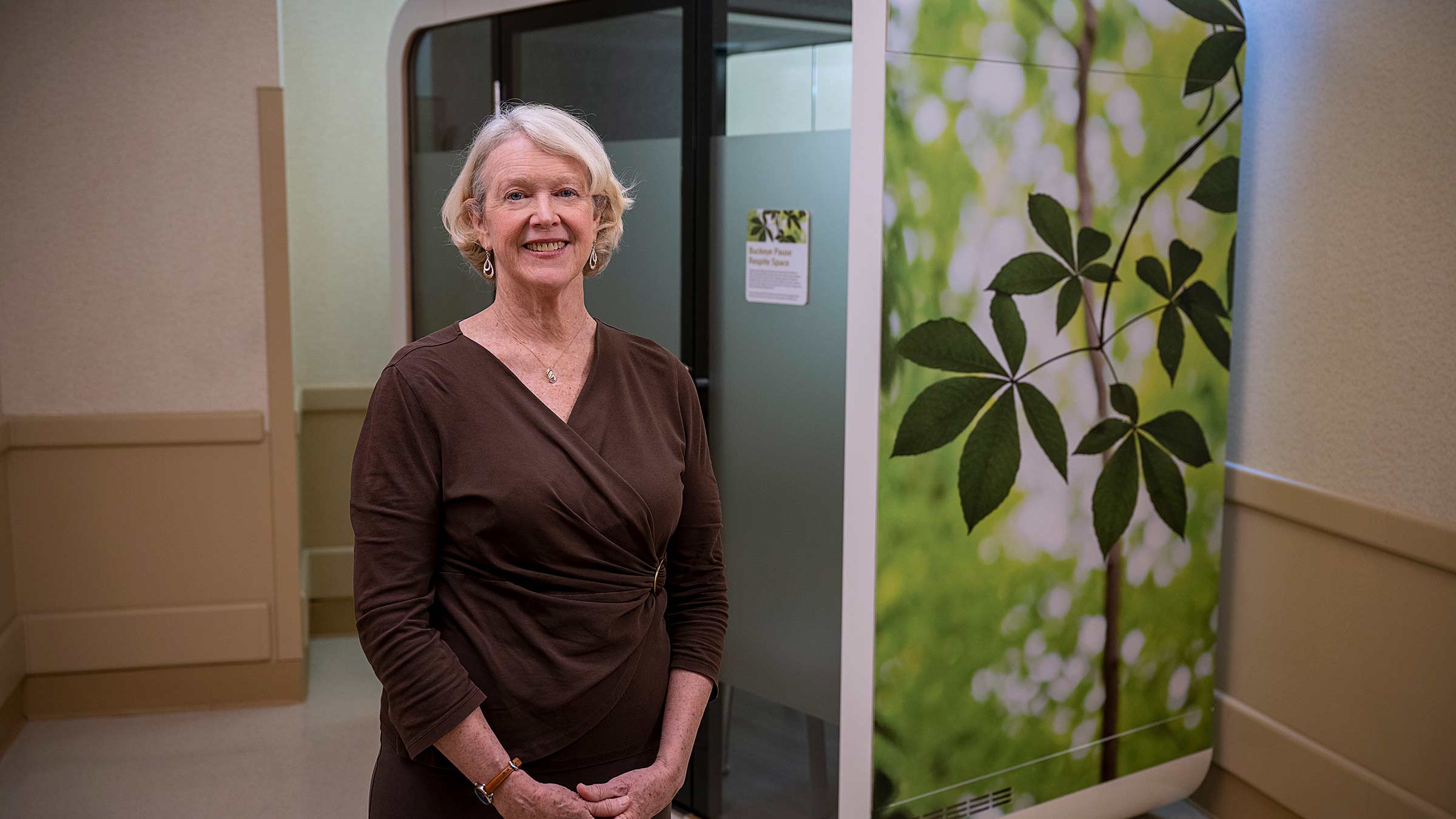 Dr. Klatt in front of the sound-proof booth