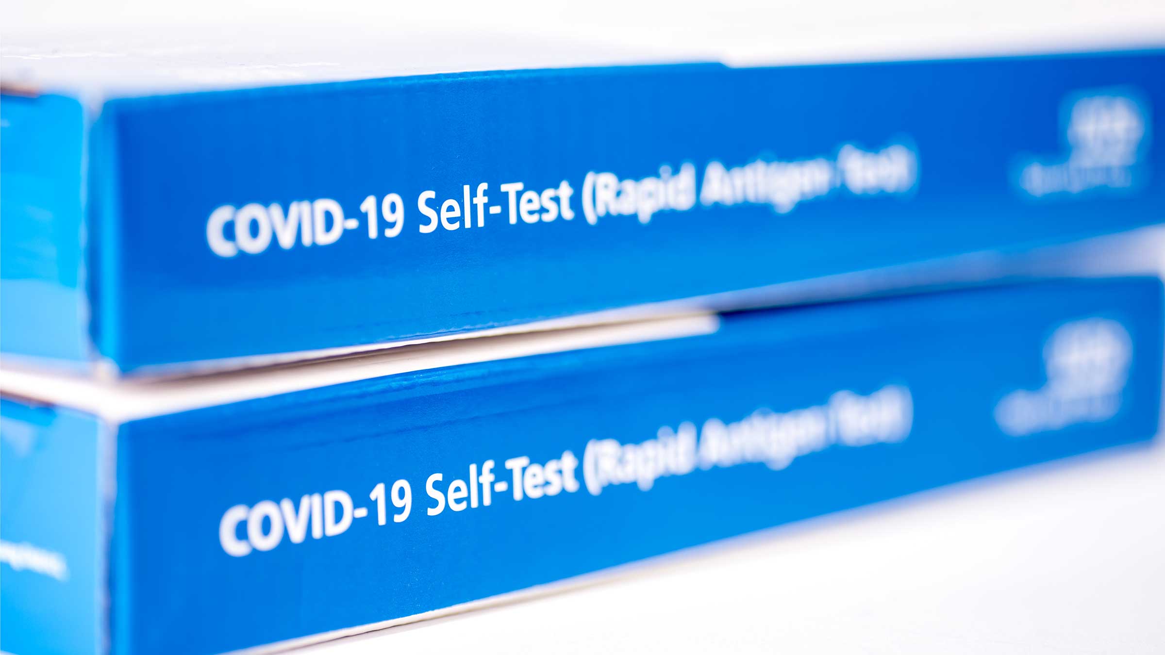 Two boxes of COVID self-tests