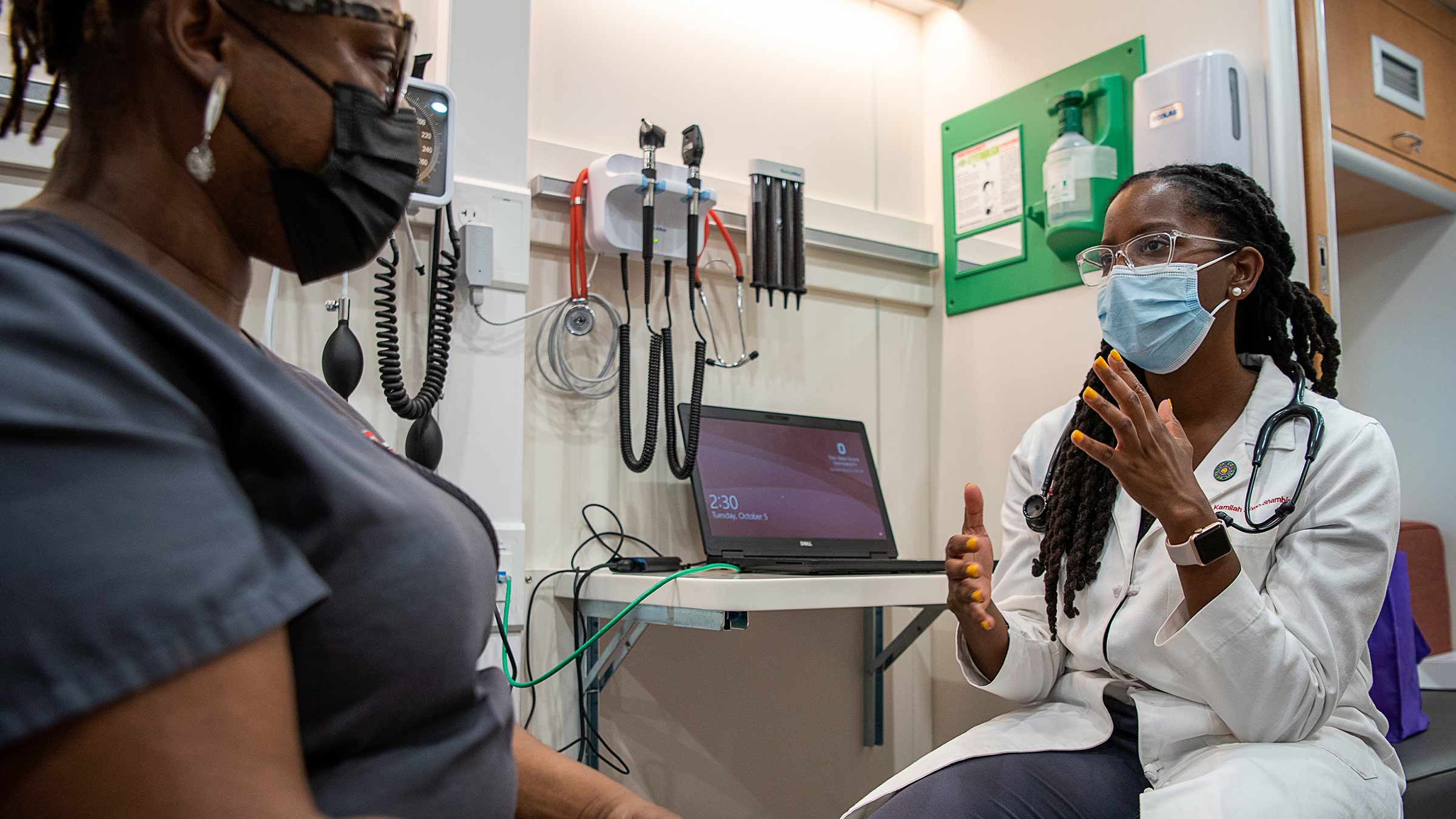 Dr. Kamilah Dixon talking to a patient