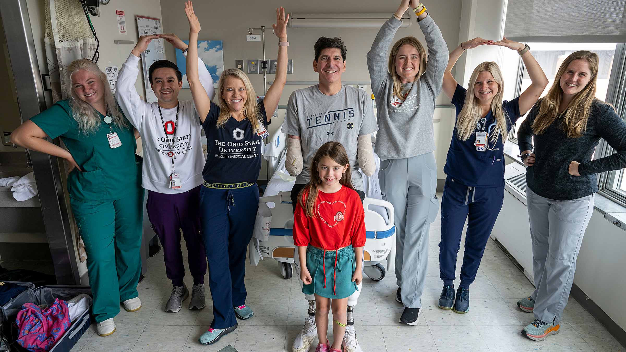 Ron Rosas with his caring team and his daughter