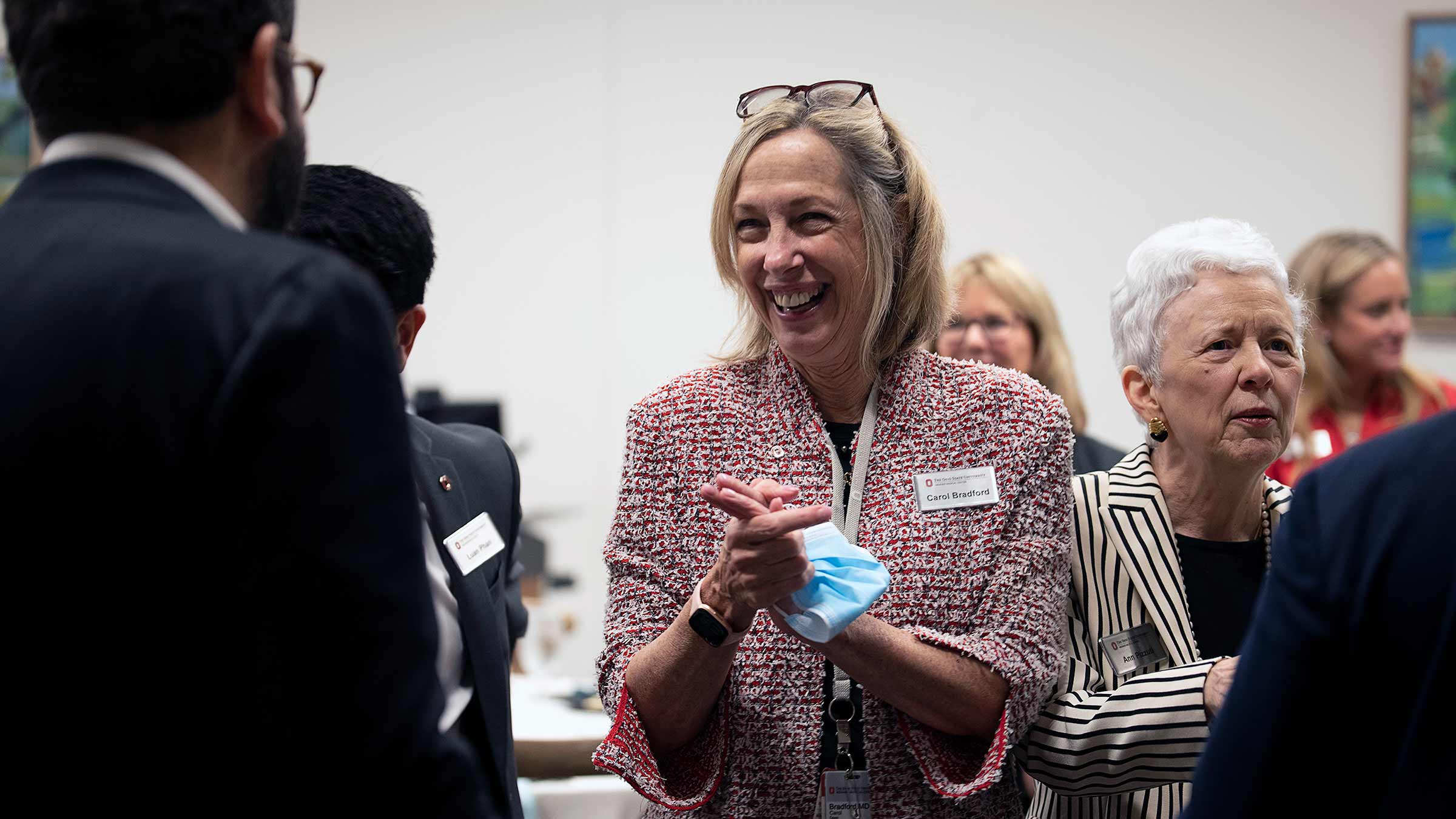 Carol Bradford talking to colleagues at the event