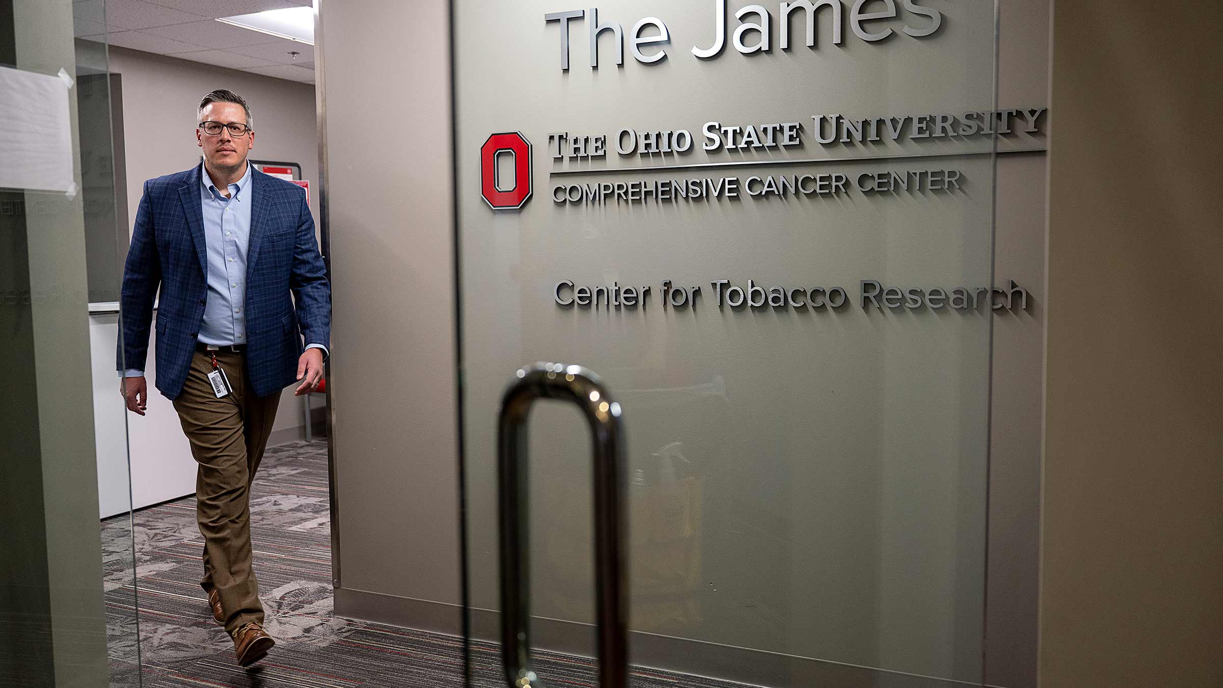 Dr. Theodore Wagner at the entrance of the center for Tobacco Research