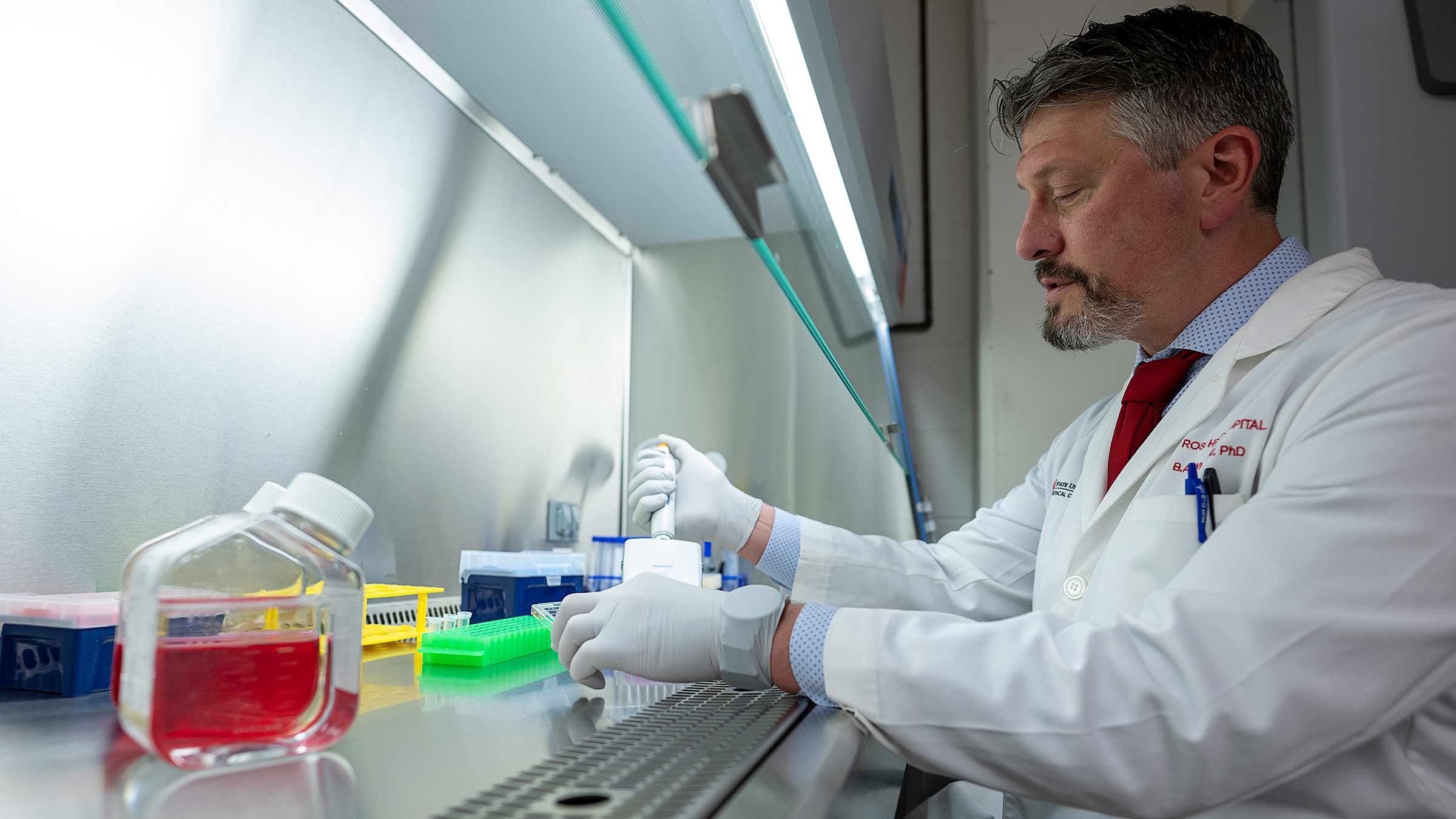 Dr. Whitson working in a lab