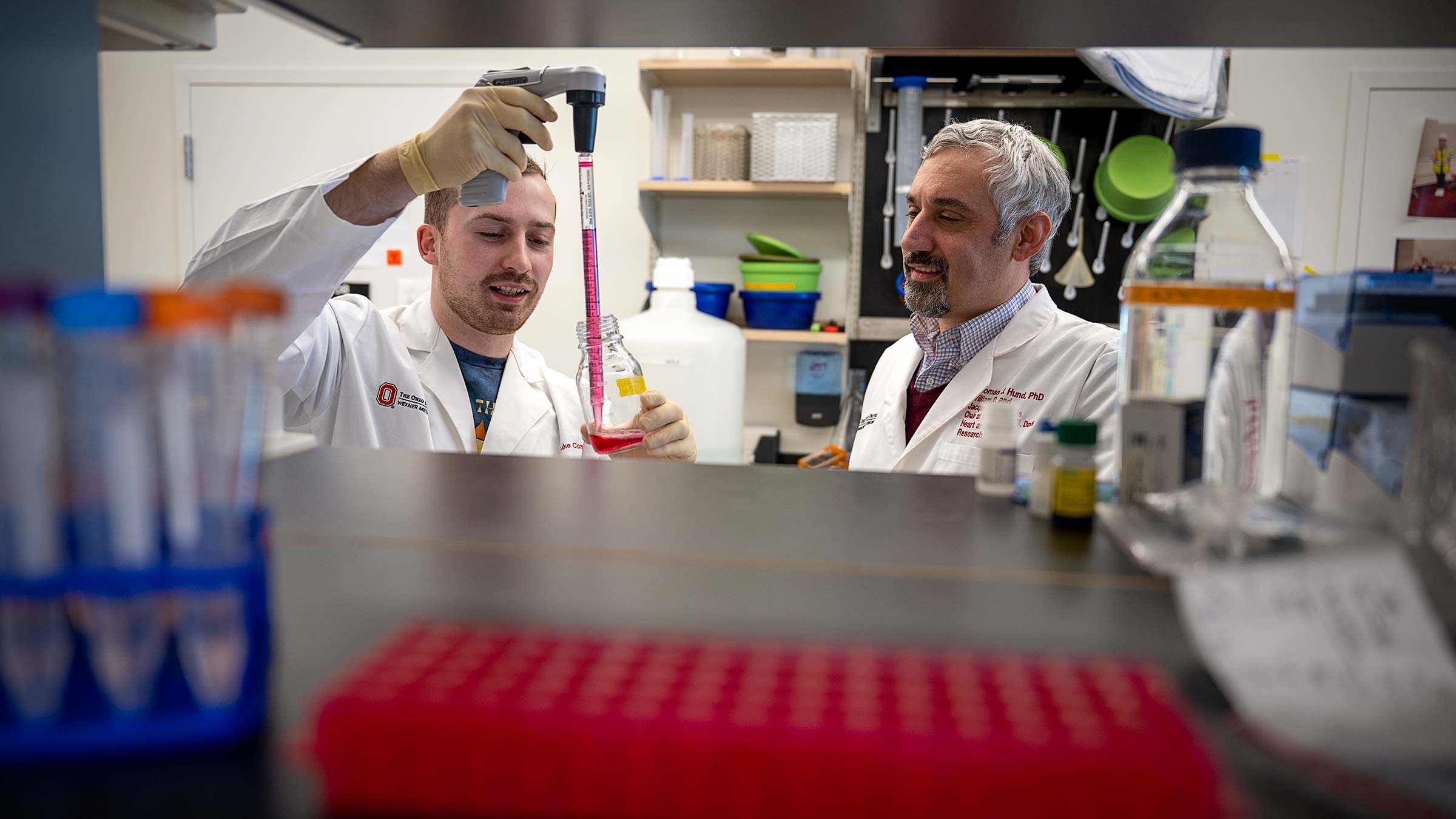 Dr. Hund in a lab with a colleague