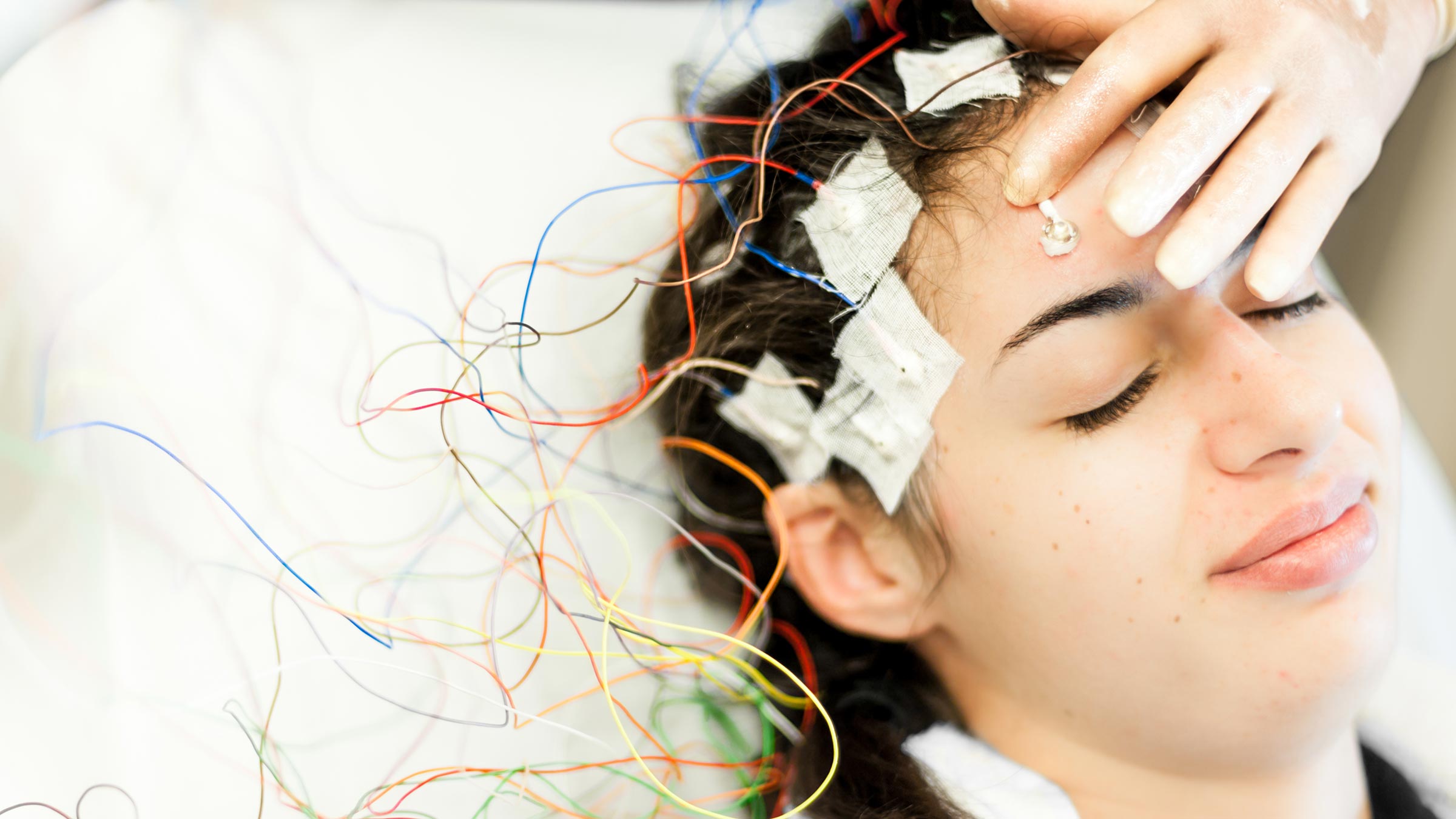 Young woman having an EEG test