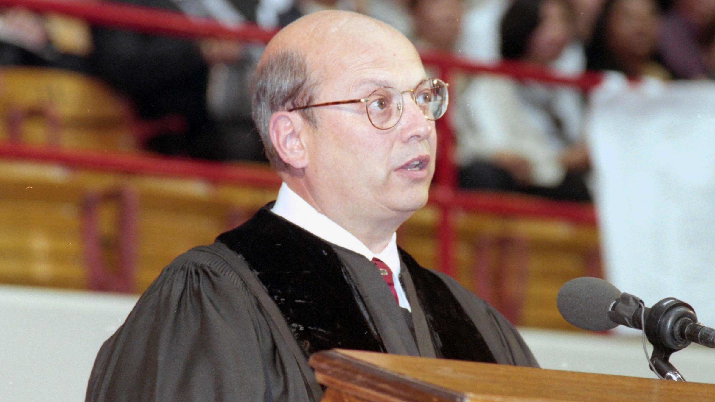 Dr. John F. Wolfe giving a commencement address