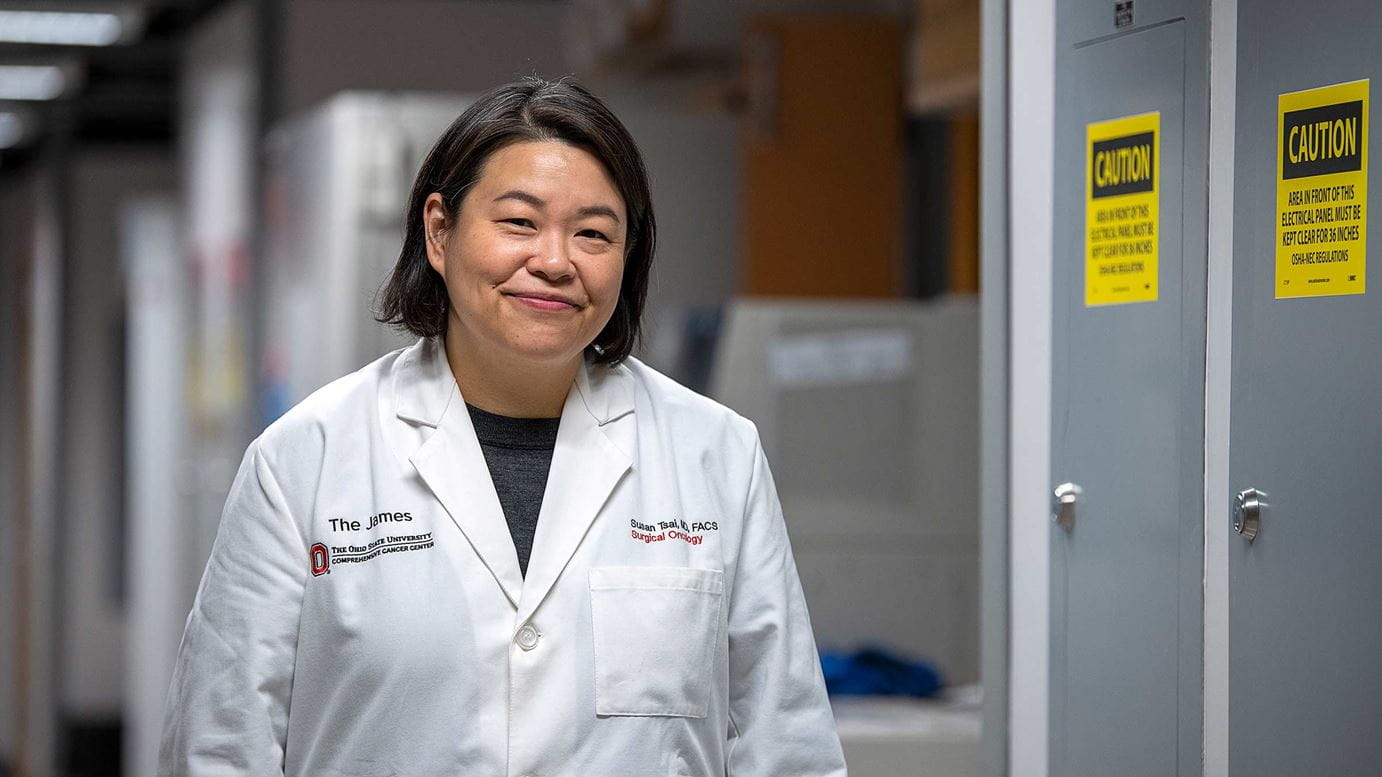 Susan Tsai walking down the hall