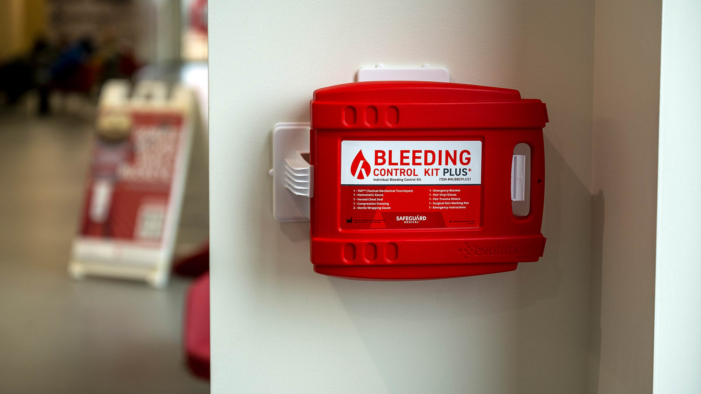 Bleeding control kit on a wall
