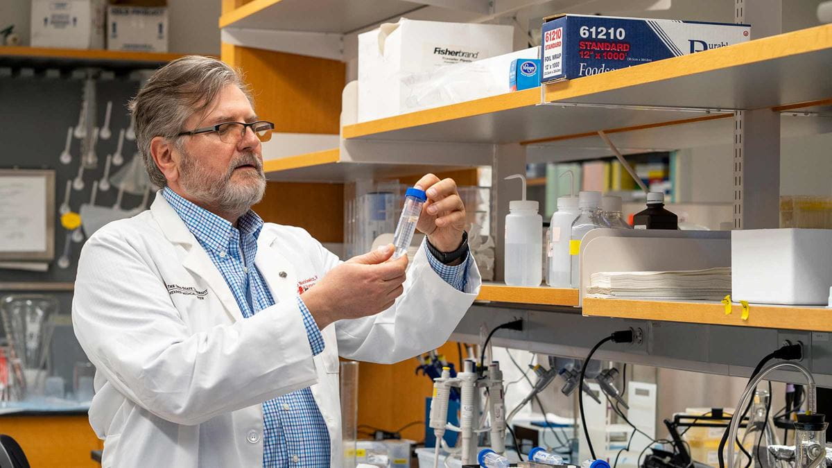 Krystof Bankiewicz in a lab