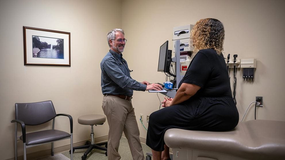 Dr. Aaron Clark family medicine exam with patient