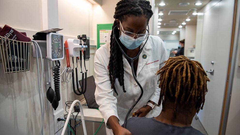 Community Care Coach Dr. Kamilah Dixon Shamble with a patient