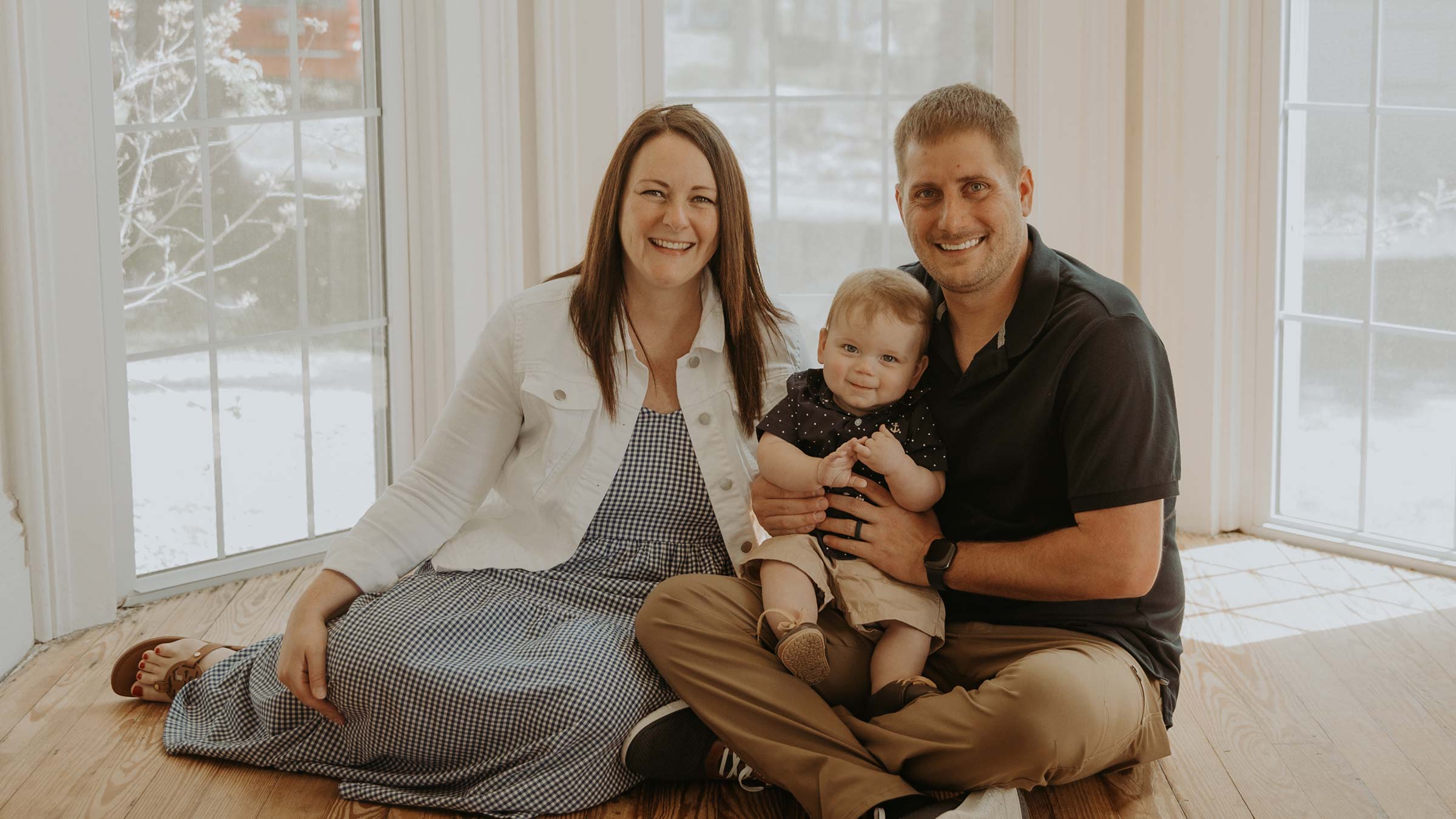 Dr. Whitney Luke with her husband and son