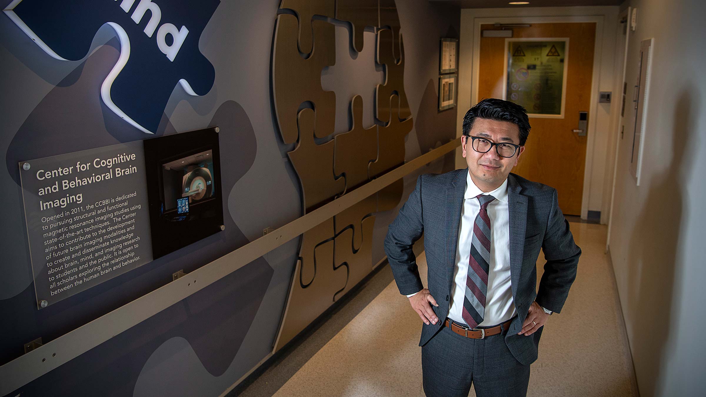 Dr. K. Laun Phan, MD in the hallway leading to the Center for Cognitive and Behavioral Brain Imaging