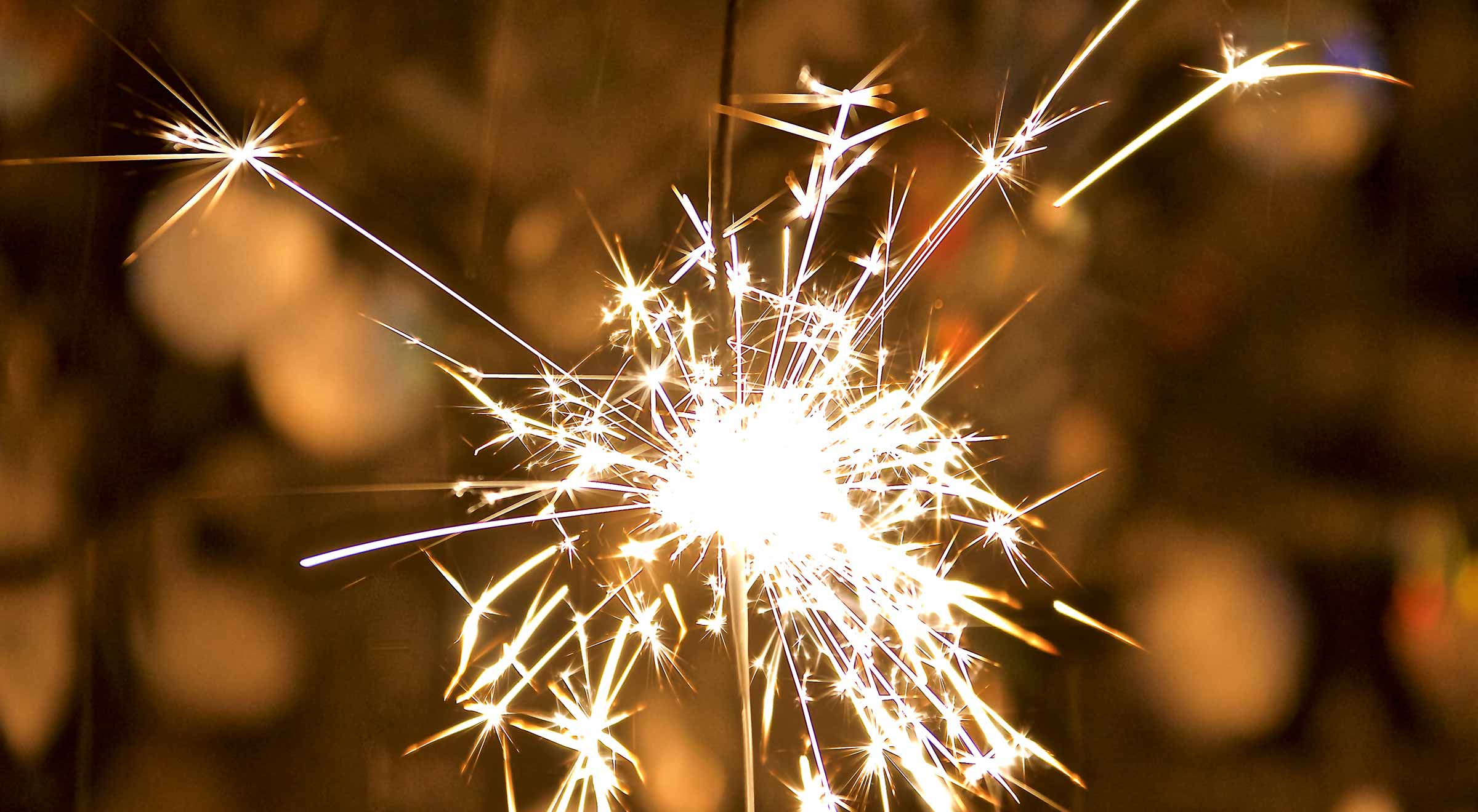 Close-up image of a sparkler burning