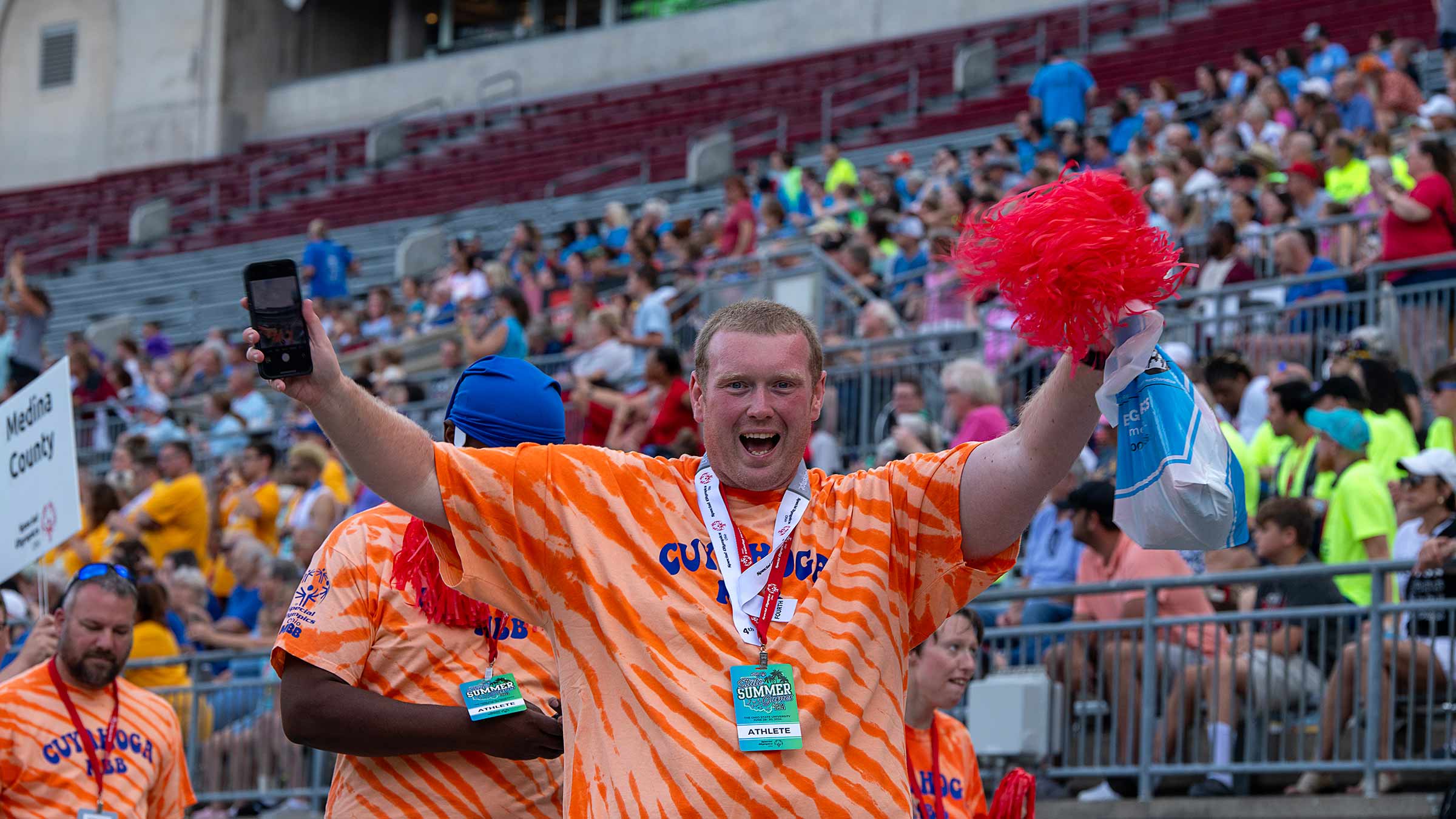 Special Olympics athlete cheering
