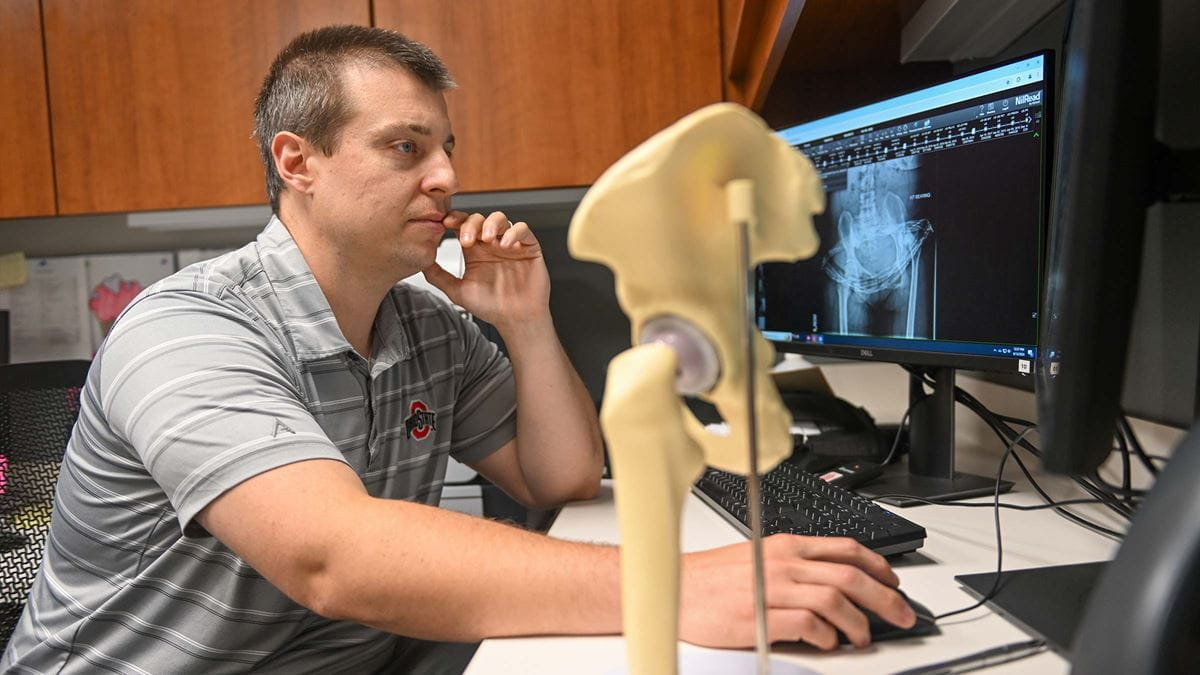 Dr. Reeves looking at the X-ray image on his computer