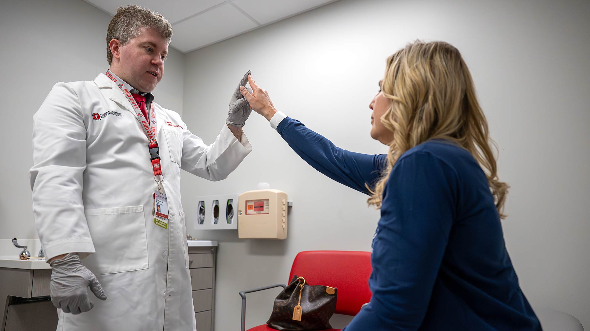 Dr. Weber examining a patient