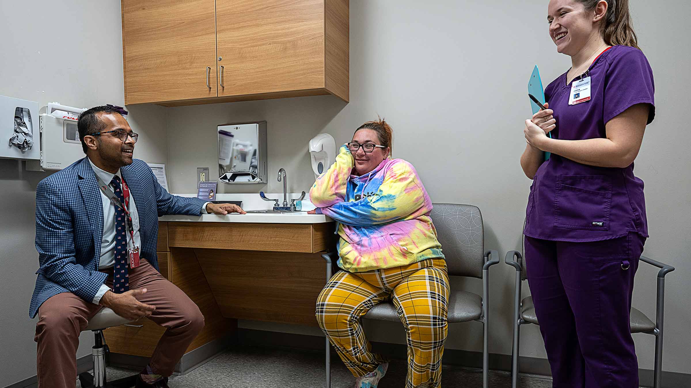 Dr. Venkatesh talking to a patient