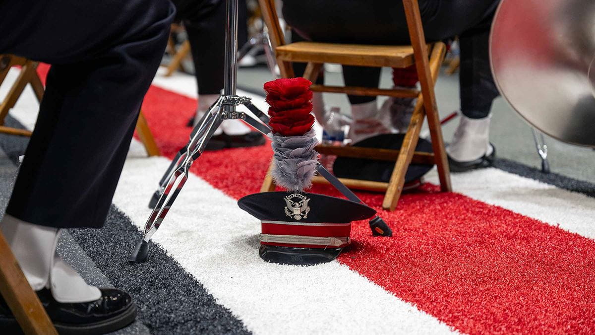 A focused shot of Grayson Niemi’s marching uniform hat