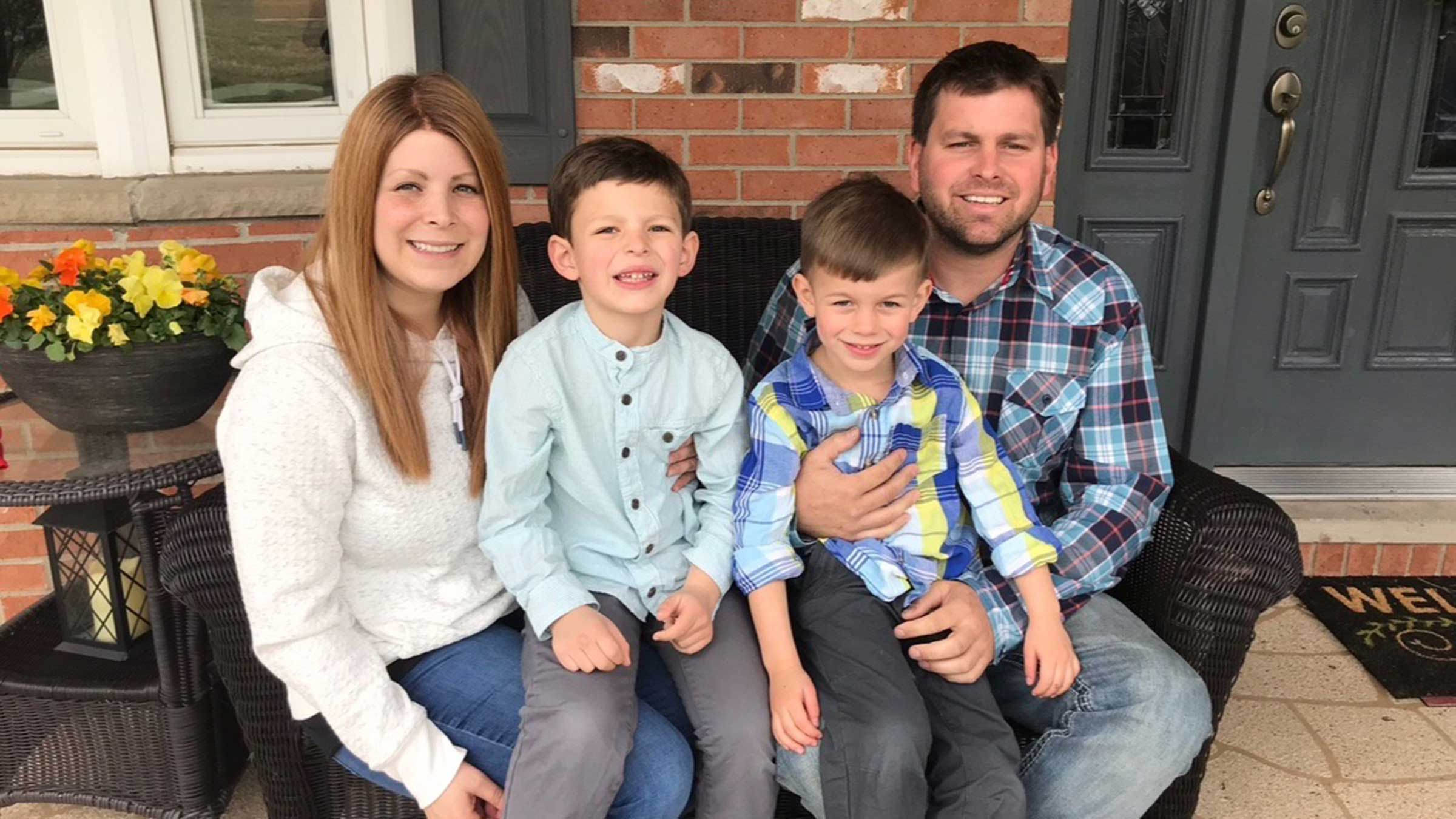 Brooke Lane with her husband and two sons