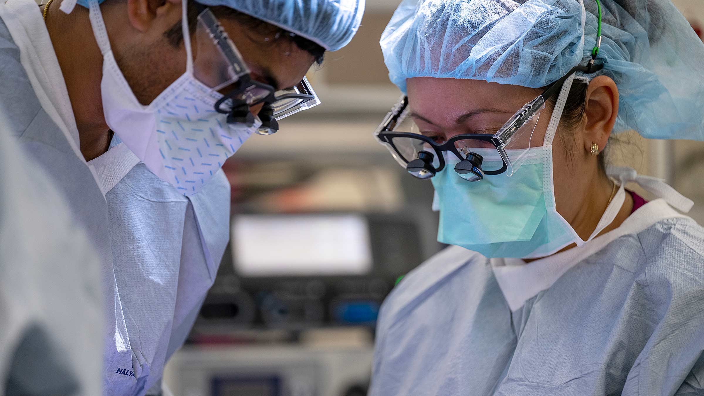 A close-up image of Dr. Kristine Orion performing surgery