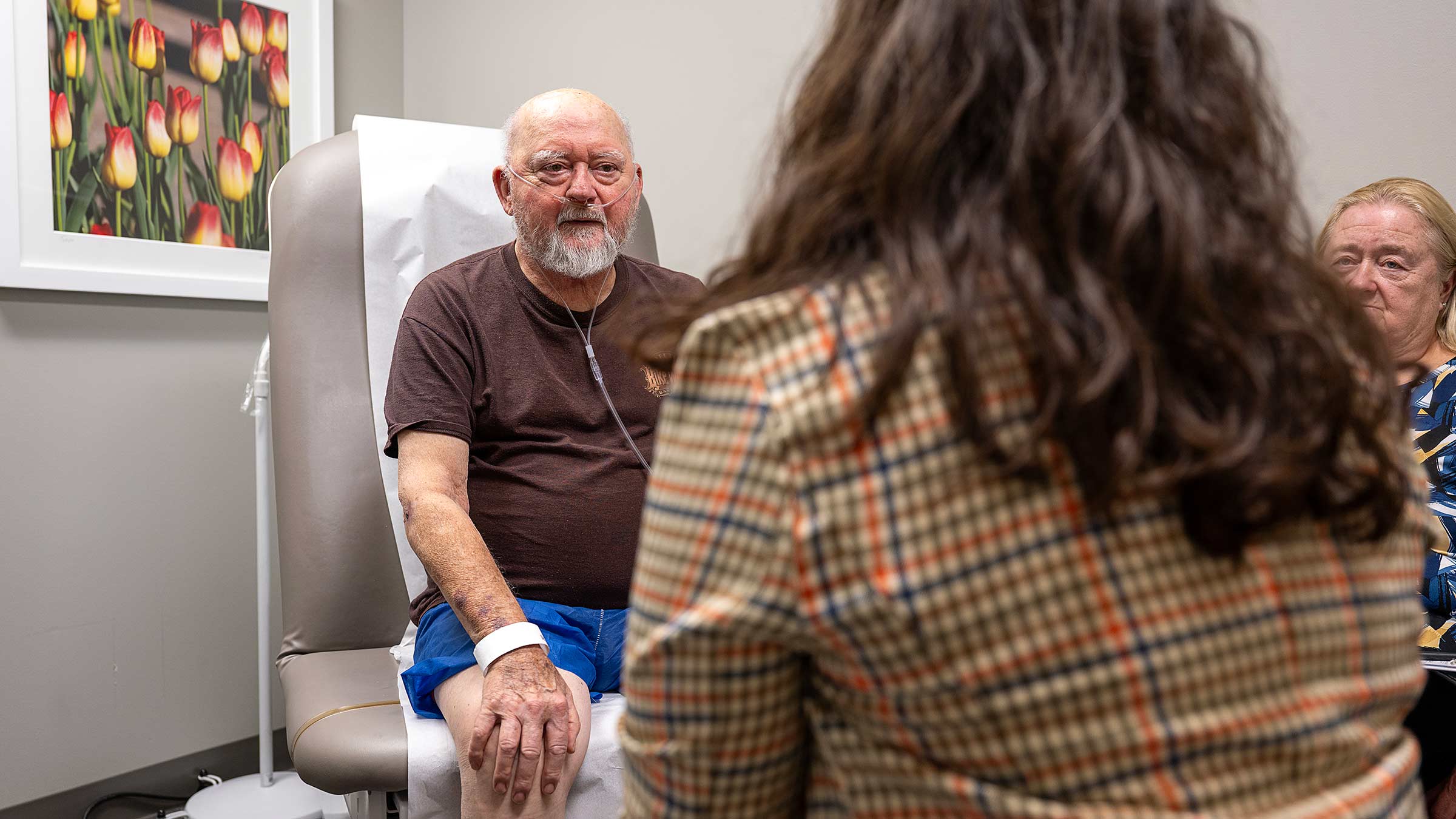 Dr. Kristine Orion consulting with a patient in the clinic