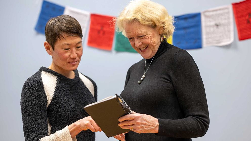 Dr. Linda Chun and Dr. Maryanna Klatt discussing notes