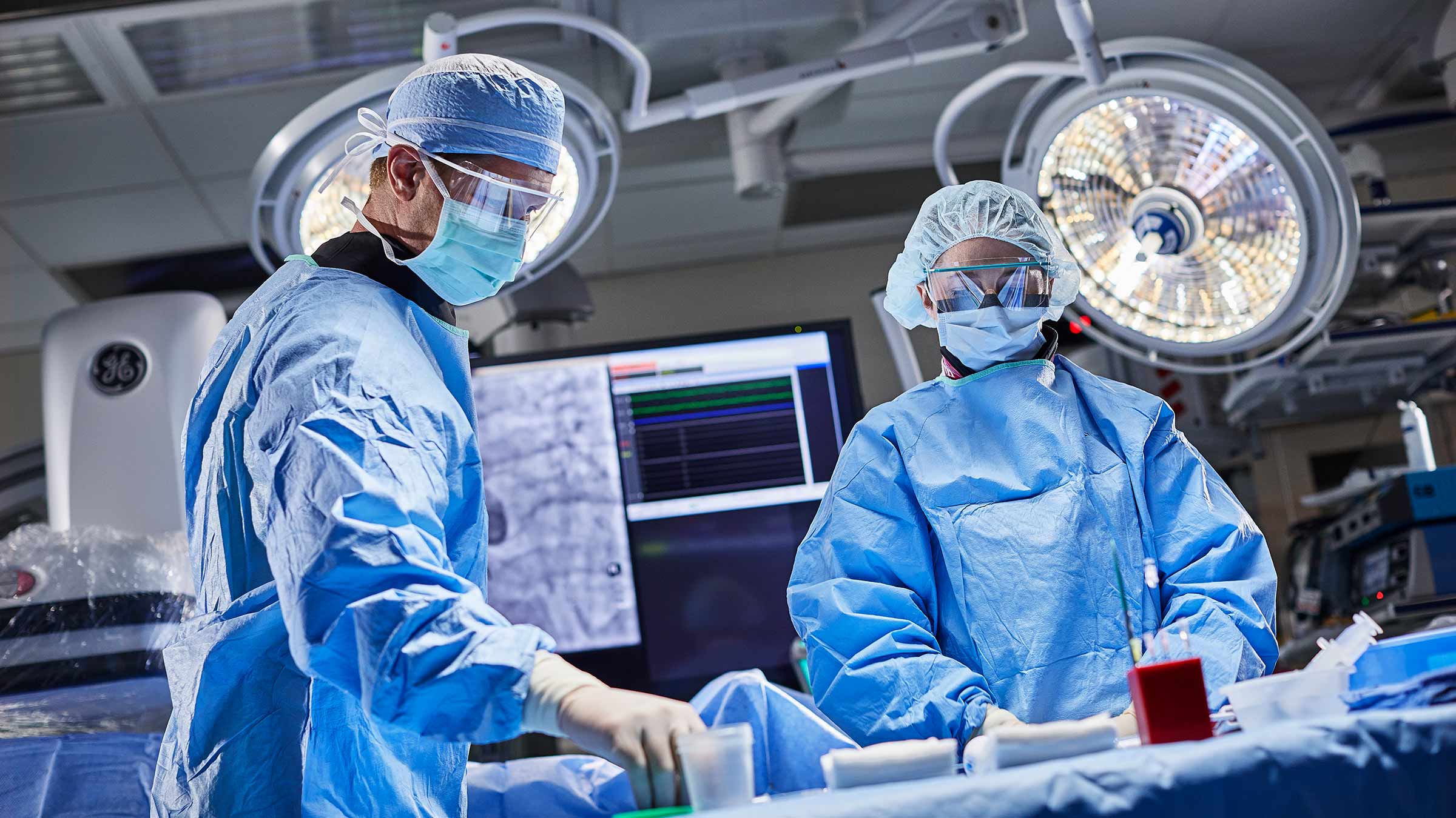 Two surgeons in the cardiac catheterization lab