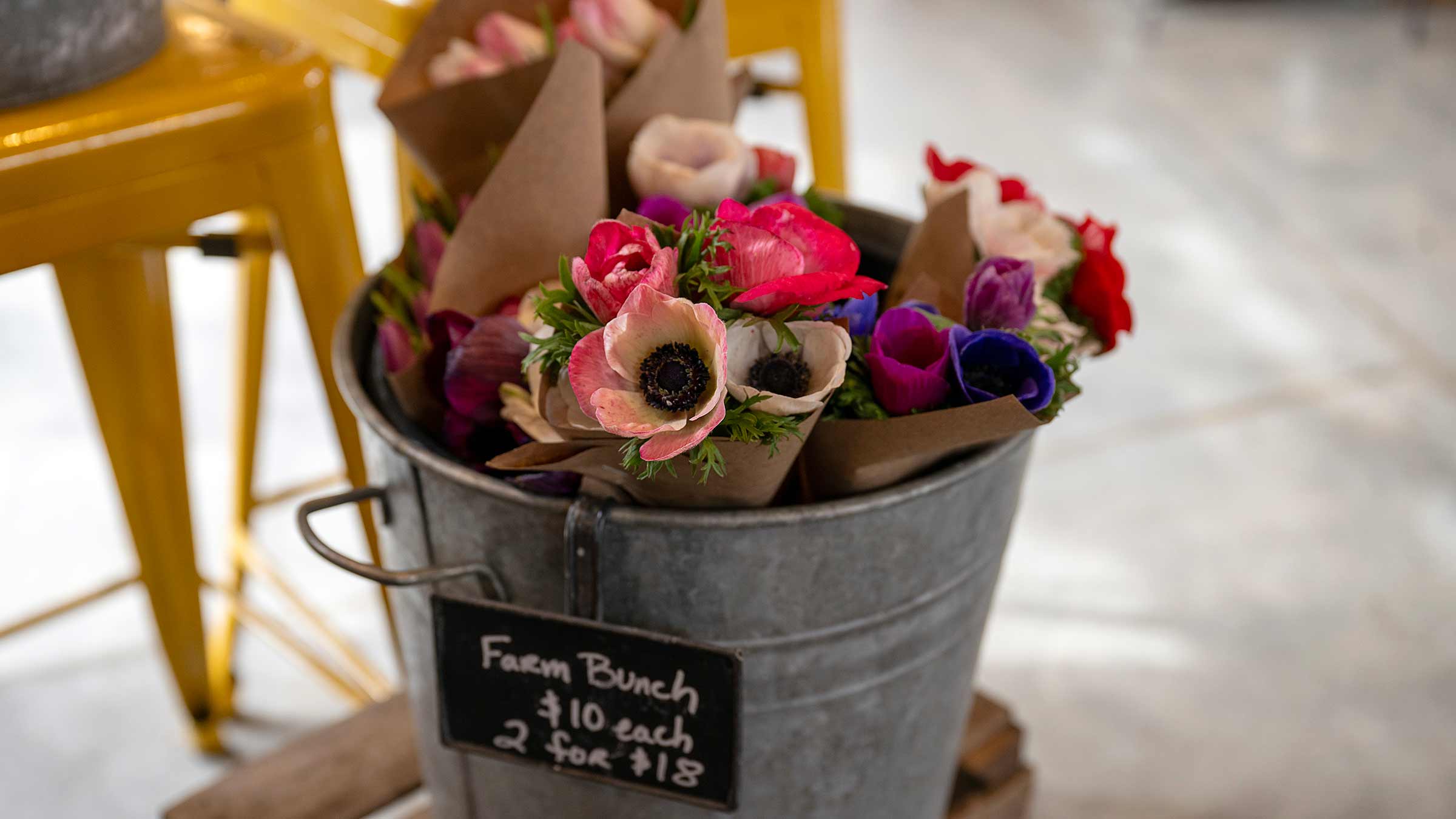 Bouquets of flowers in a bucket