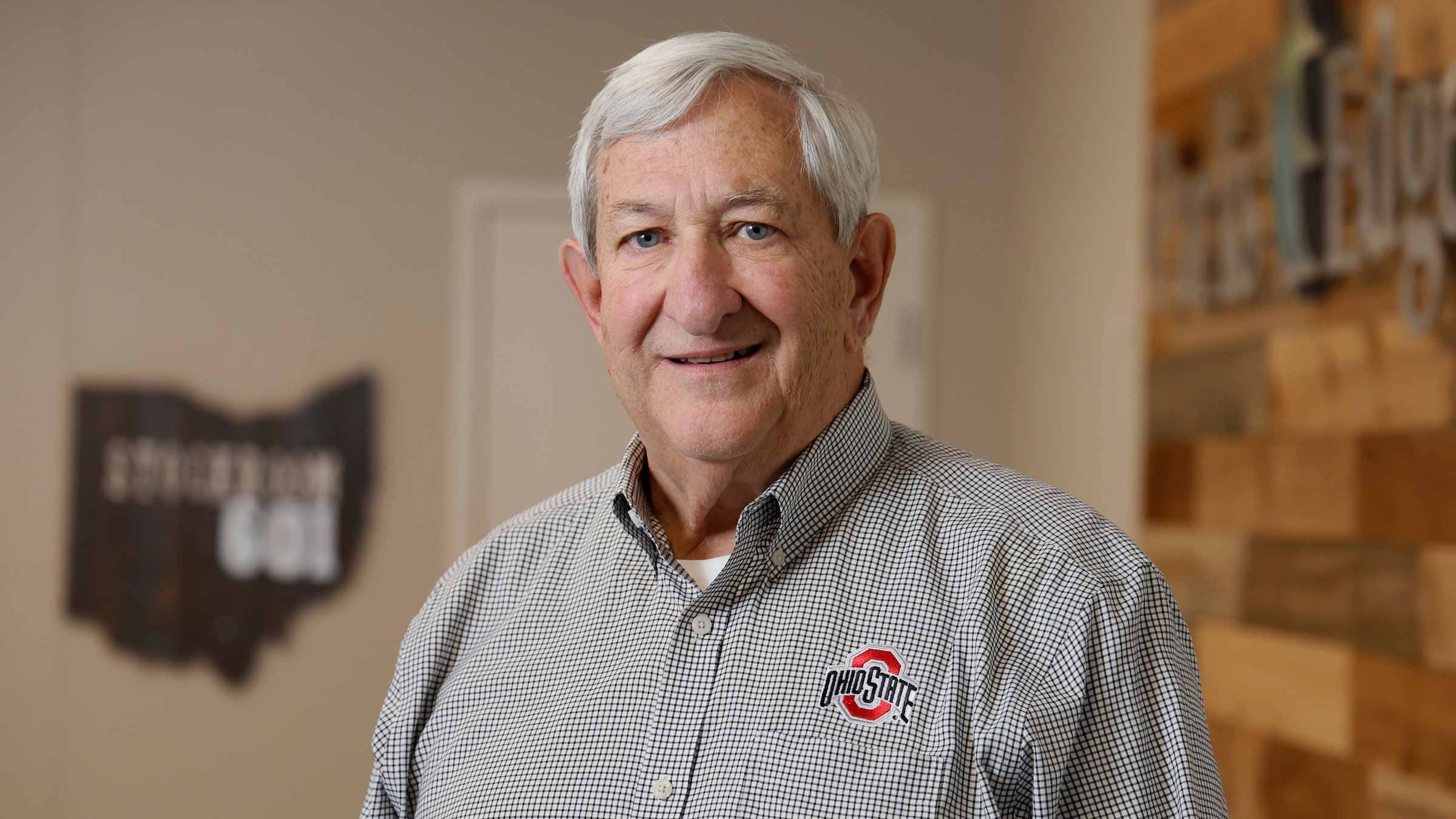 Alan Stockmeister wearing an Ohio State button up shirt