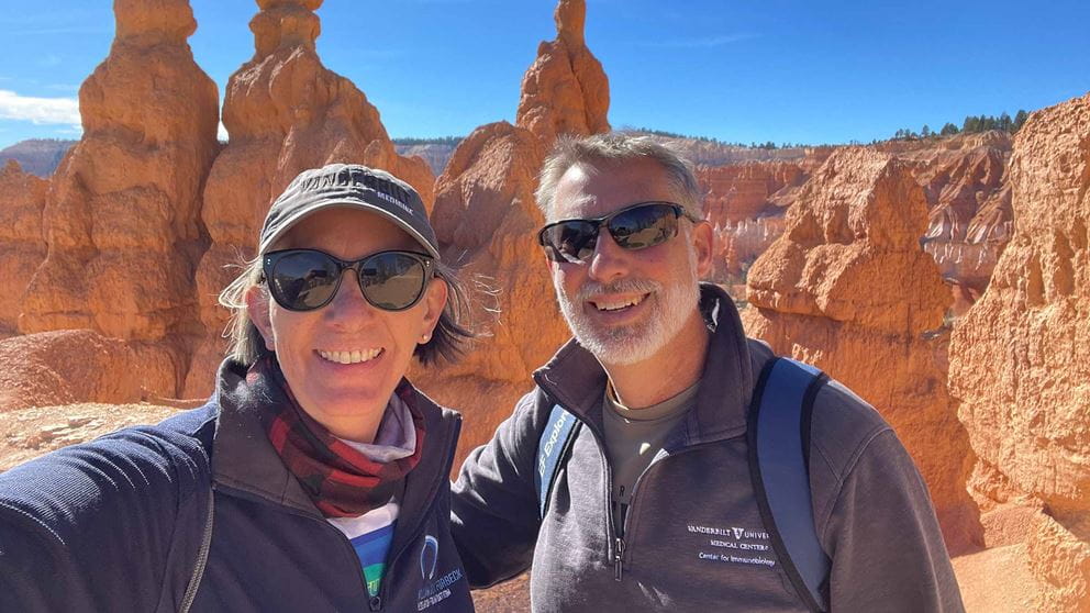 Dr. Kimryn Rathmell with her husband at a canyon