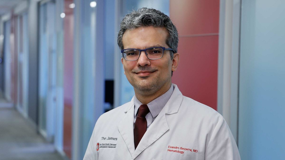 Hematologist, Evandro Bezerra in his medical uniform