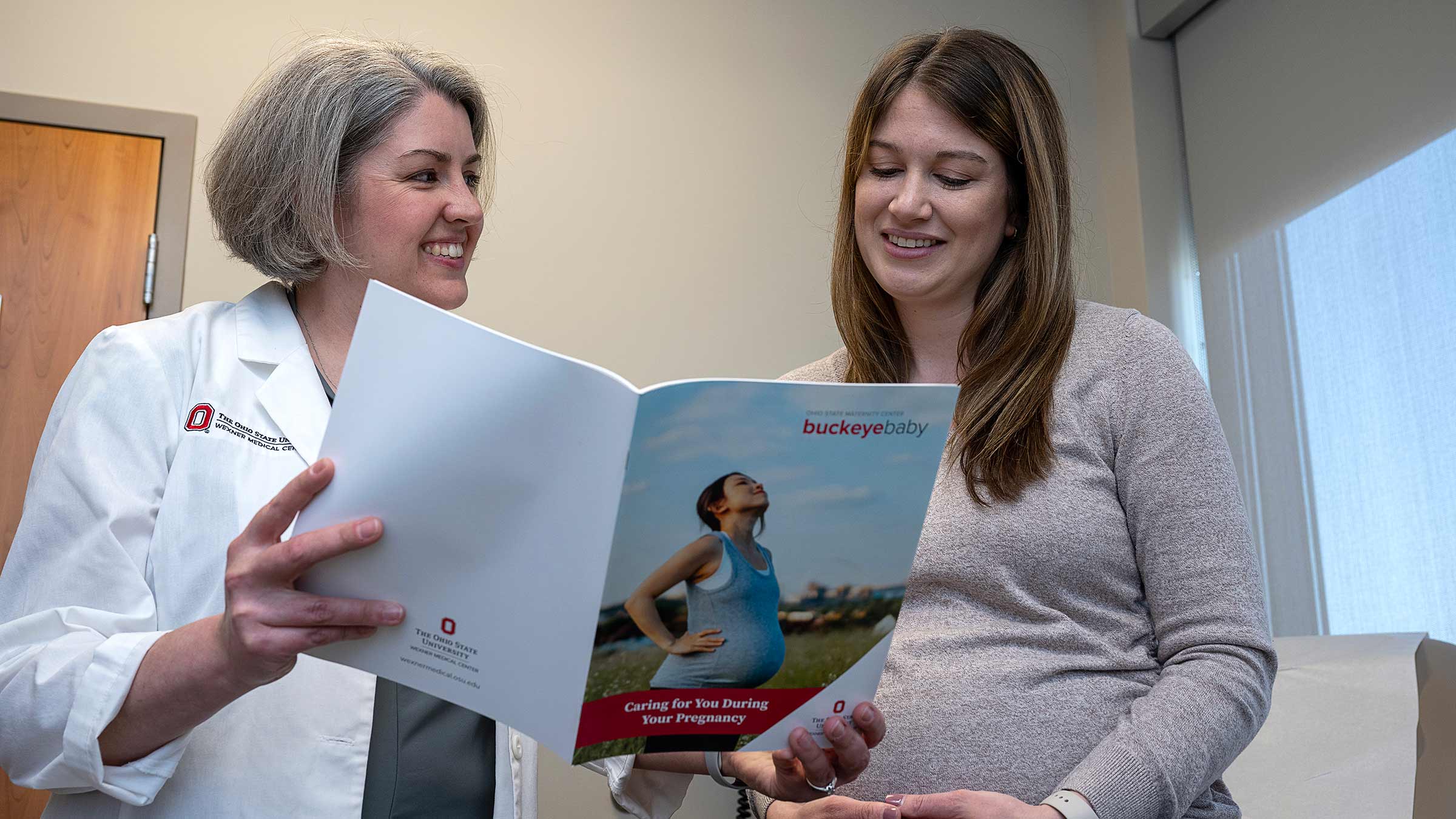 Dr. Austin talking to a patient