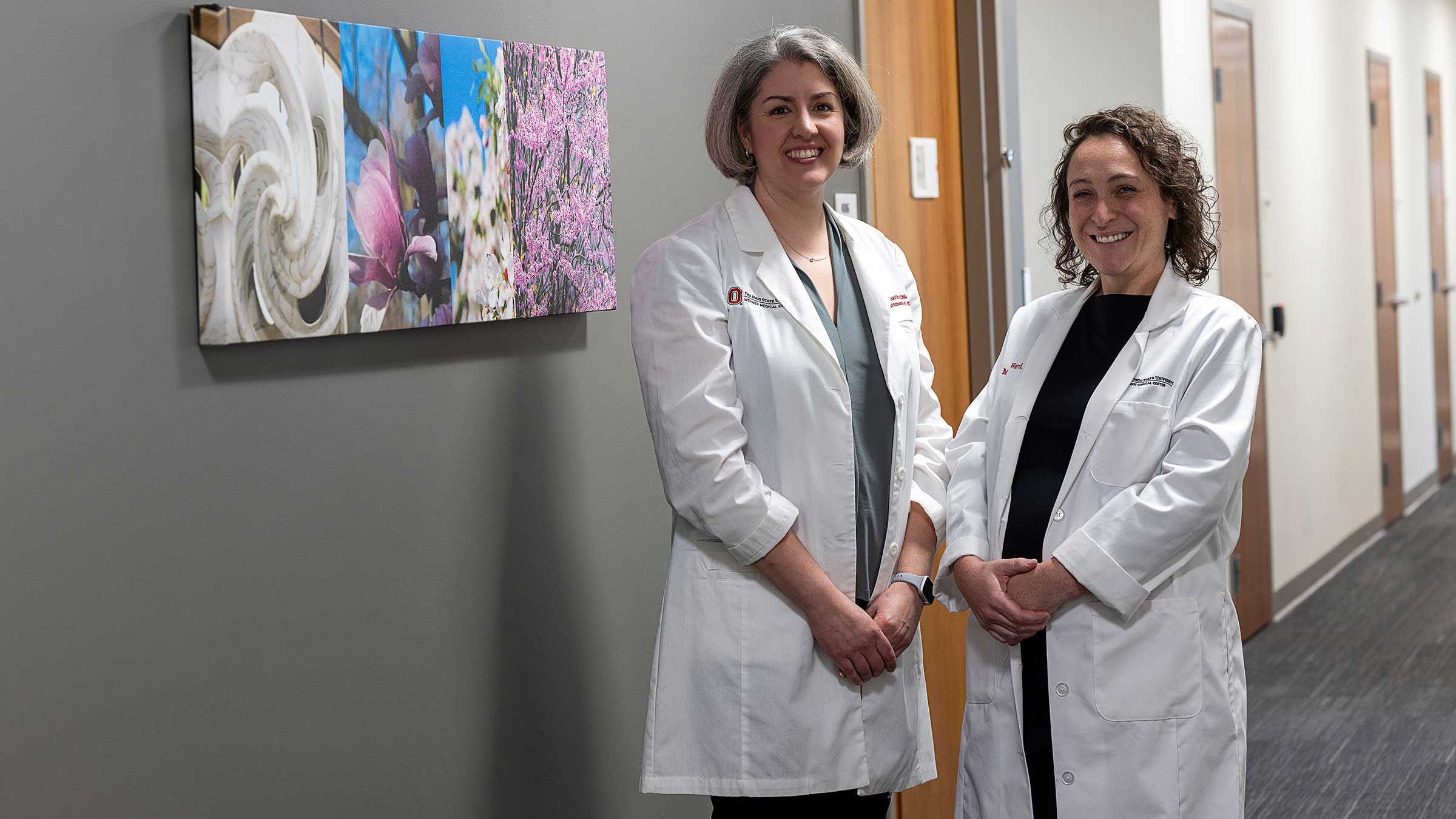 Dr. Austin and Dr. Ward standing in a hallway