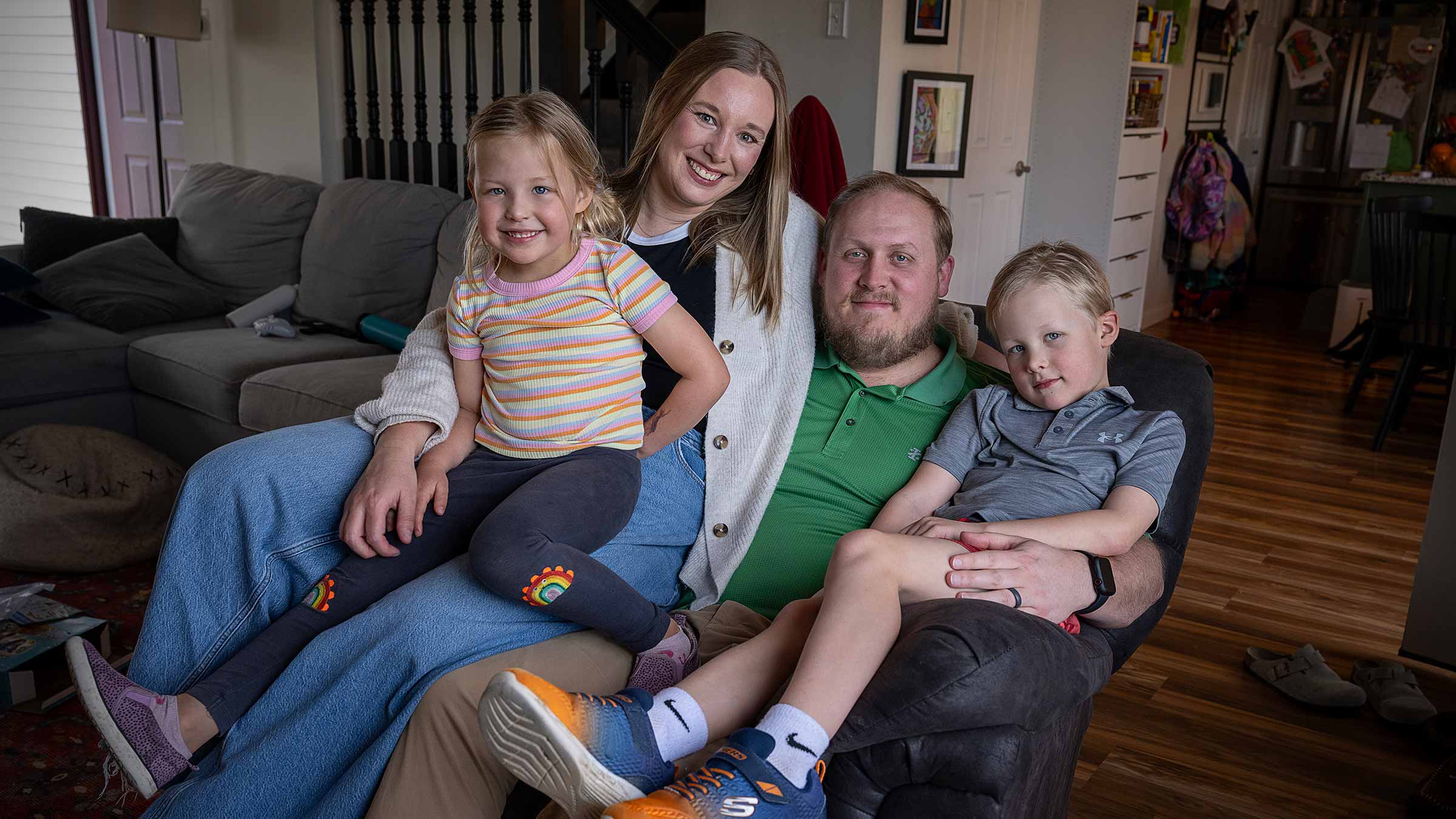 Emma Anderson with her family in their living room