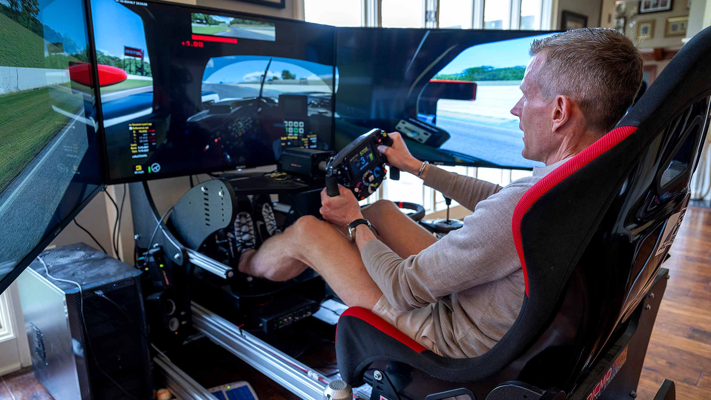 Malcolm Ross in a racing simulator