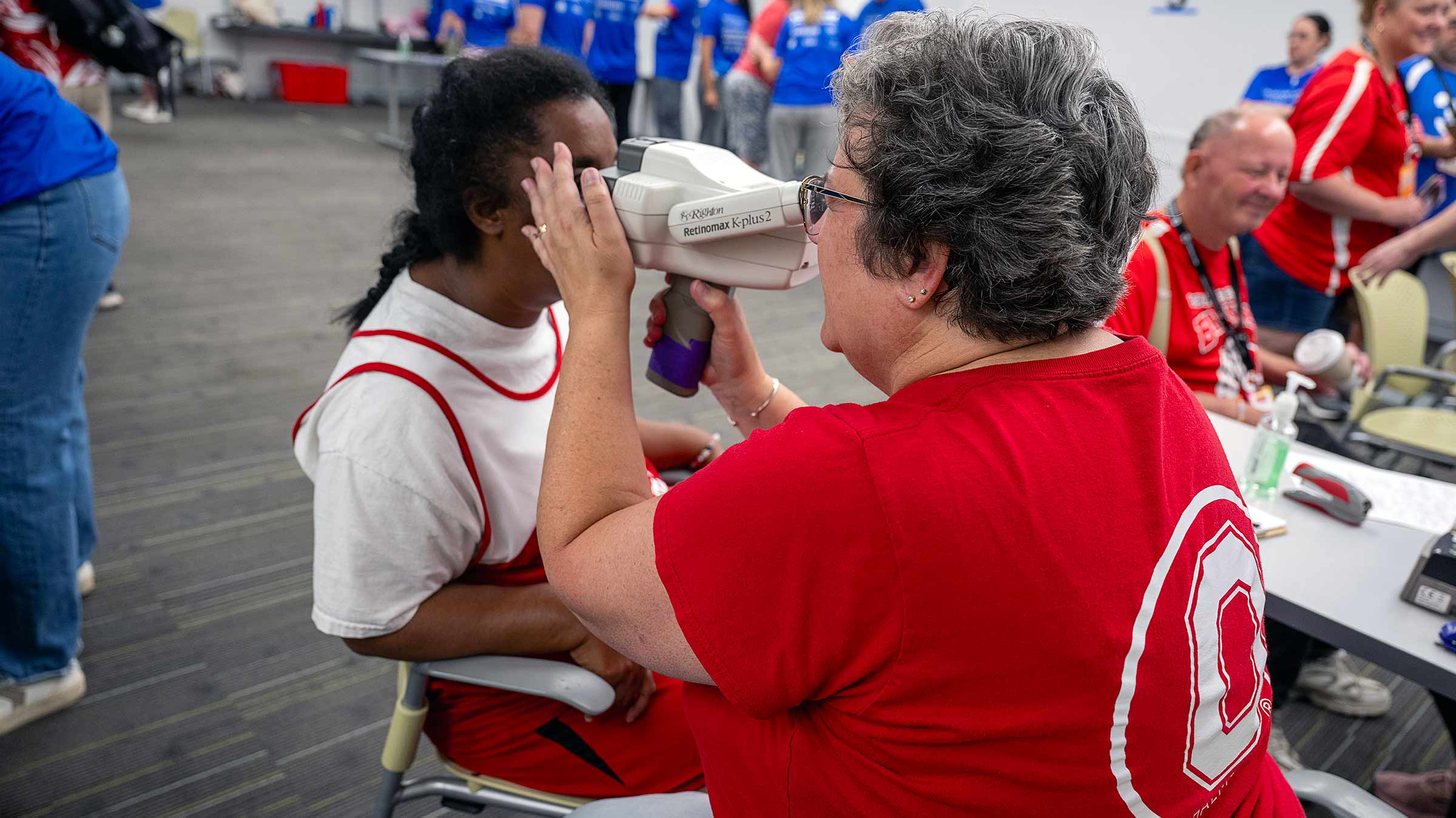 Special Olympics participant undergoing a vision exam