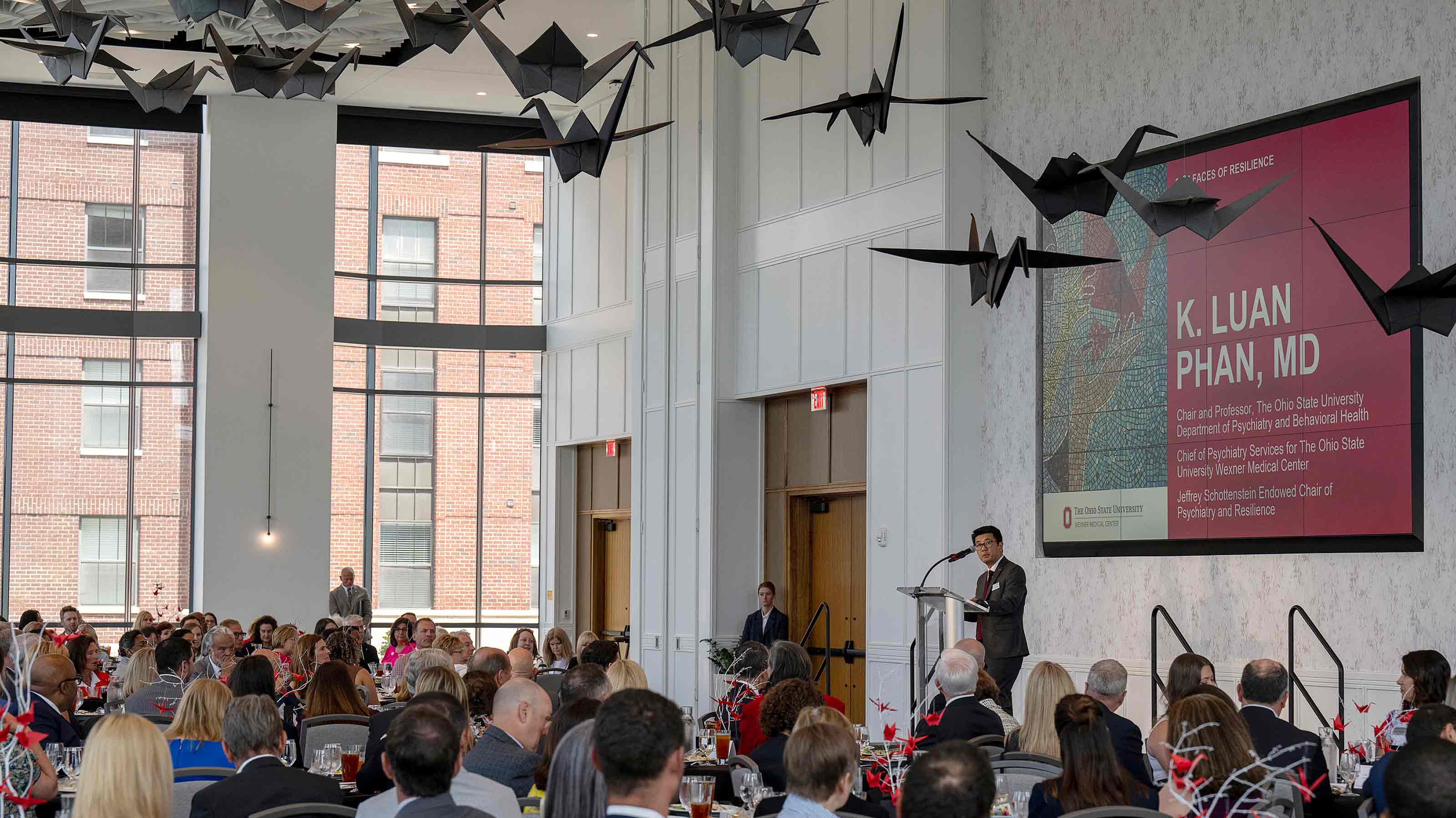 Luan Phan, MD, speaking at the "Faces of Resilience" fundraising event
