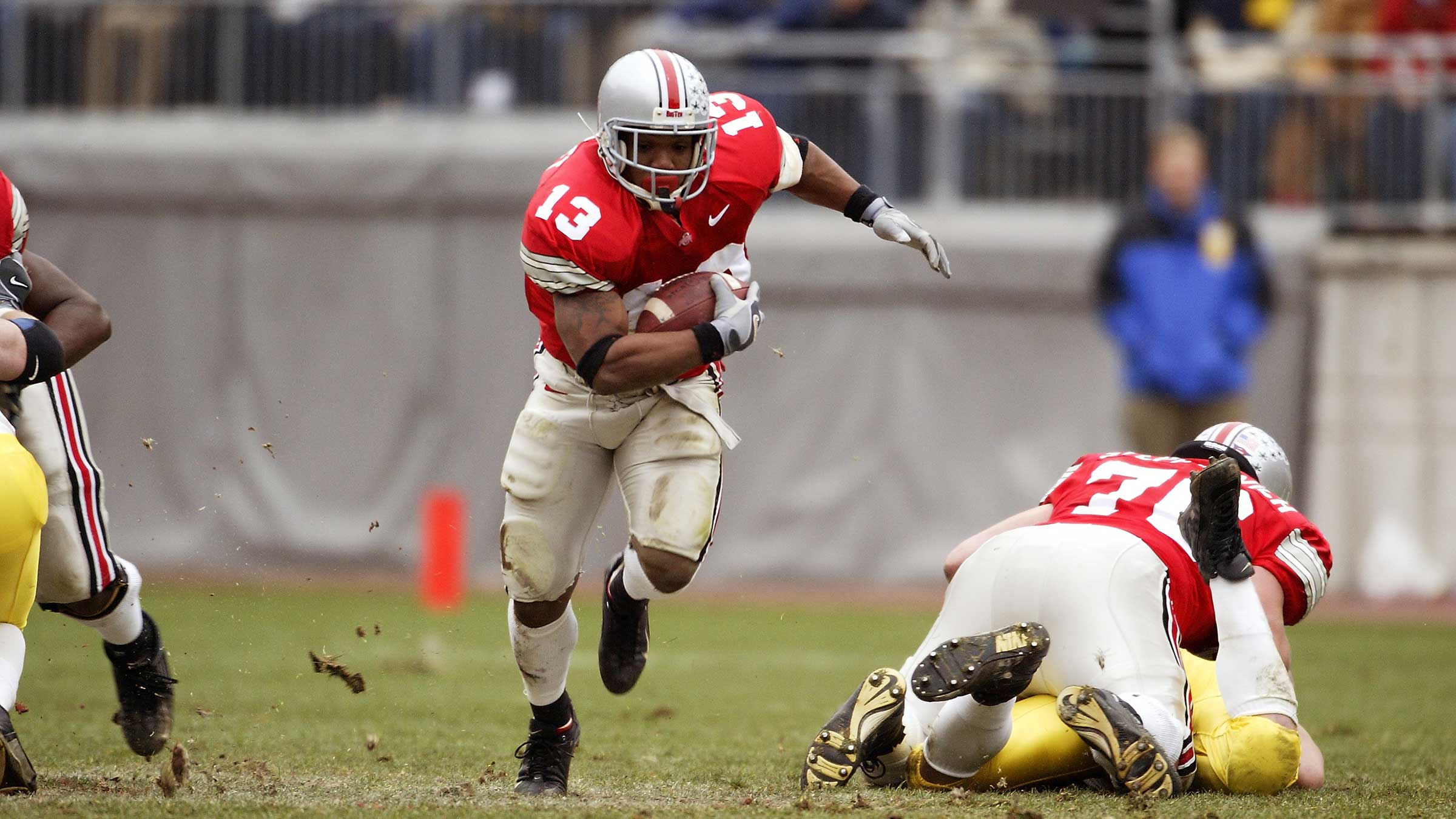 Maurice Clarett running with the football during a Michigan game