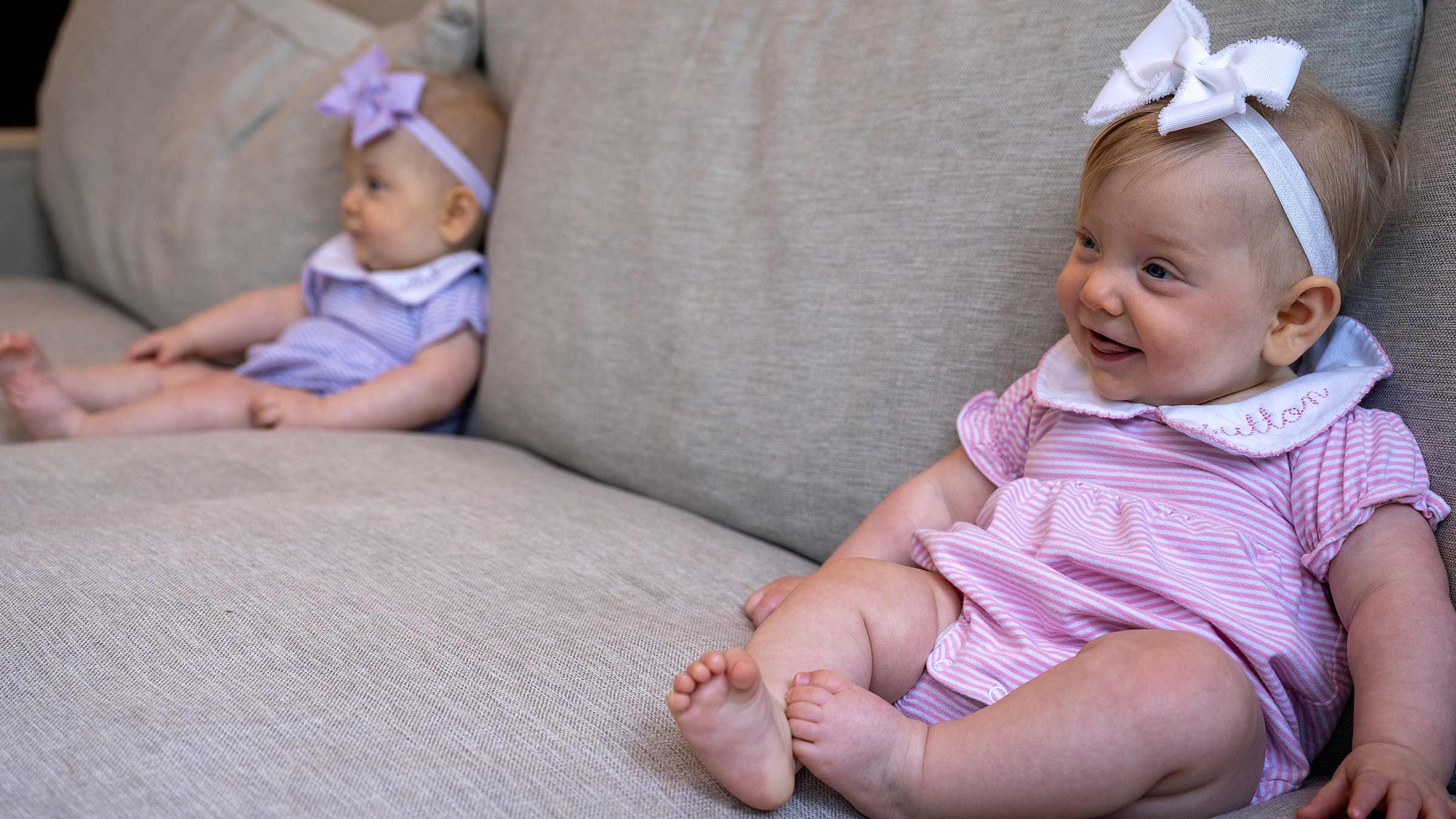 Twins Sutton and Callahan sitting on a couch