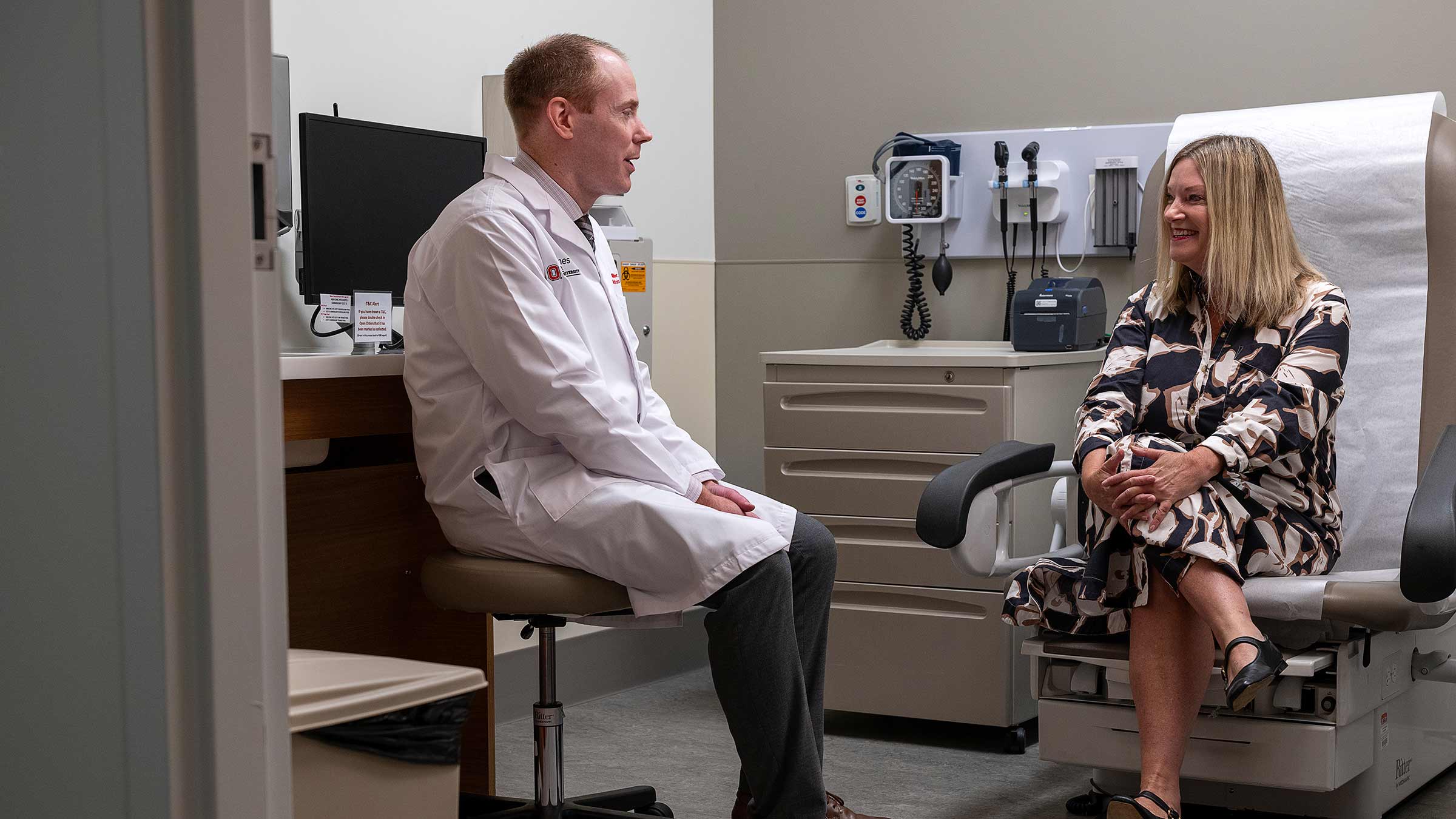 Julia DeVillers talking to Dr. Miller