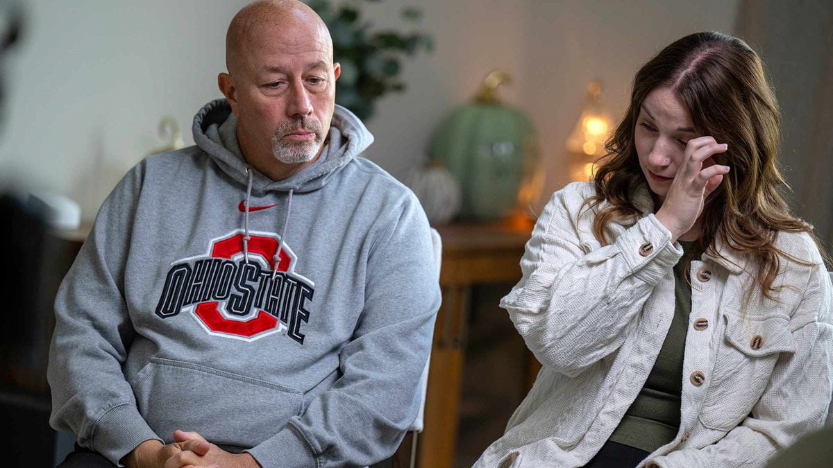 Carmen Zone sitting next to his daughter