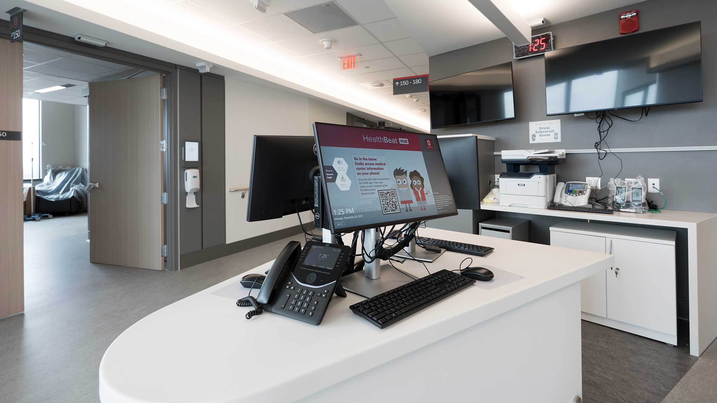 Staff touchdown stations outside patient rooms