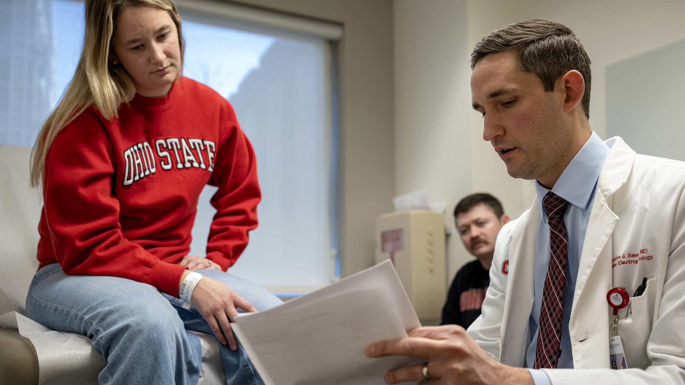 Dr.  Salvatore Savona goes over results with Shayna Hemmings