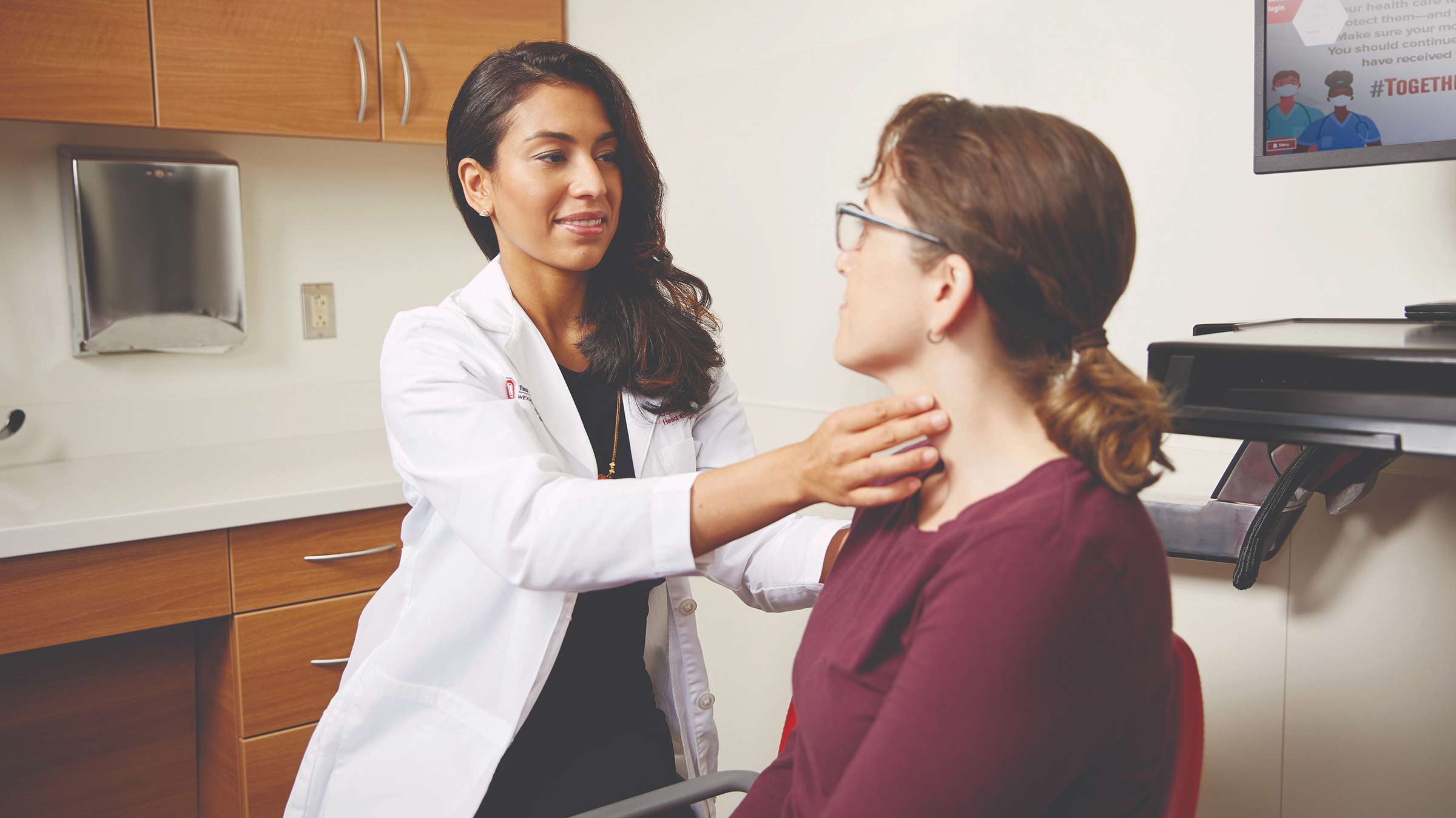 A doctor examining a patient 
