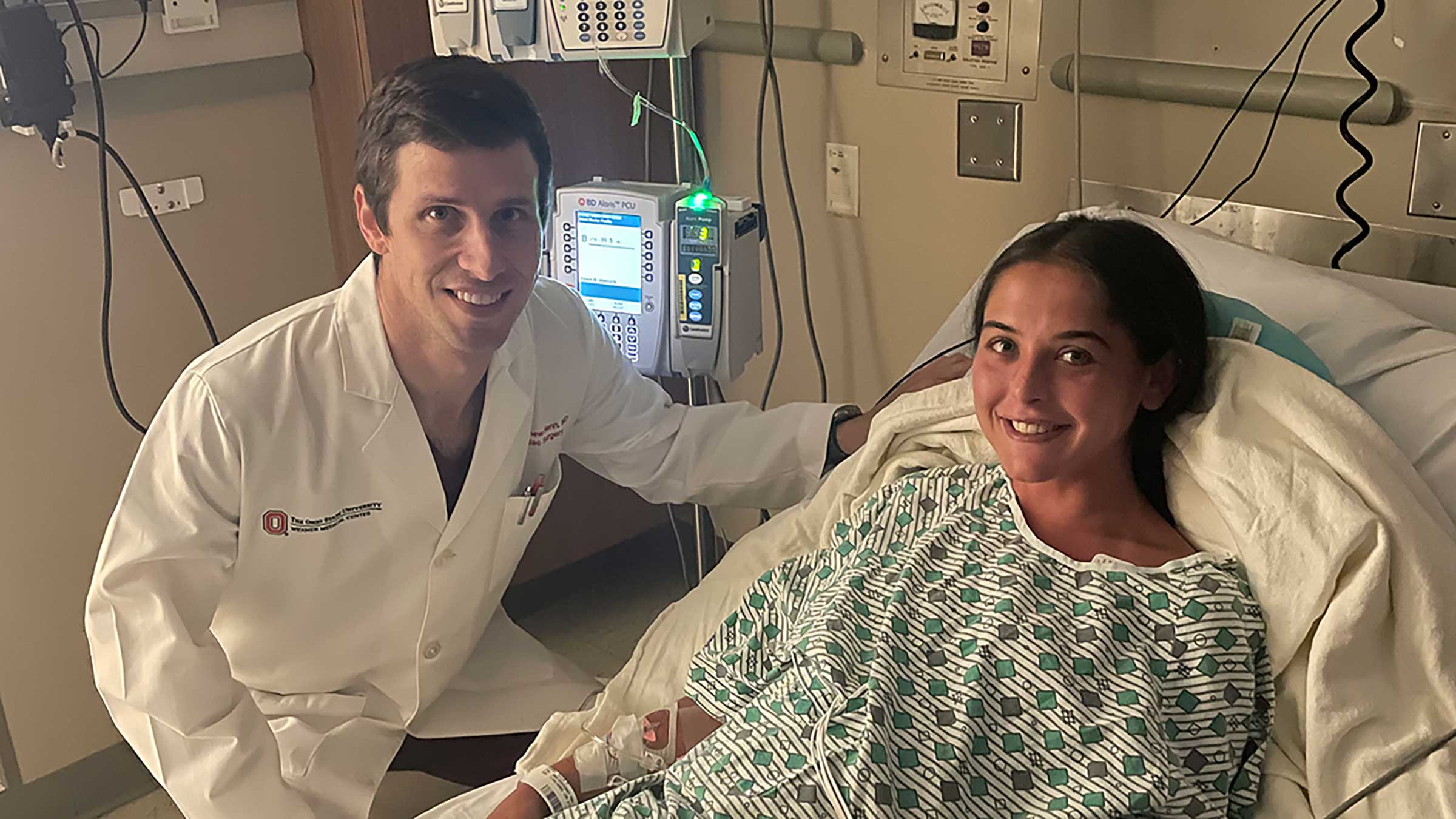 Cardiac Surgeon, Dr. Matthew Henn, and patient, Ella DuBro in a hospital room